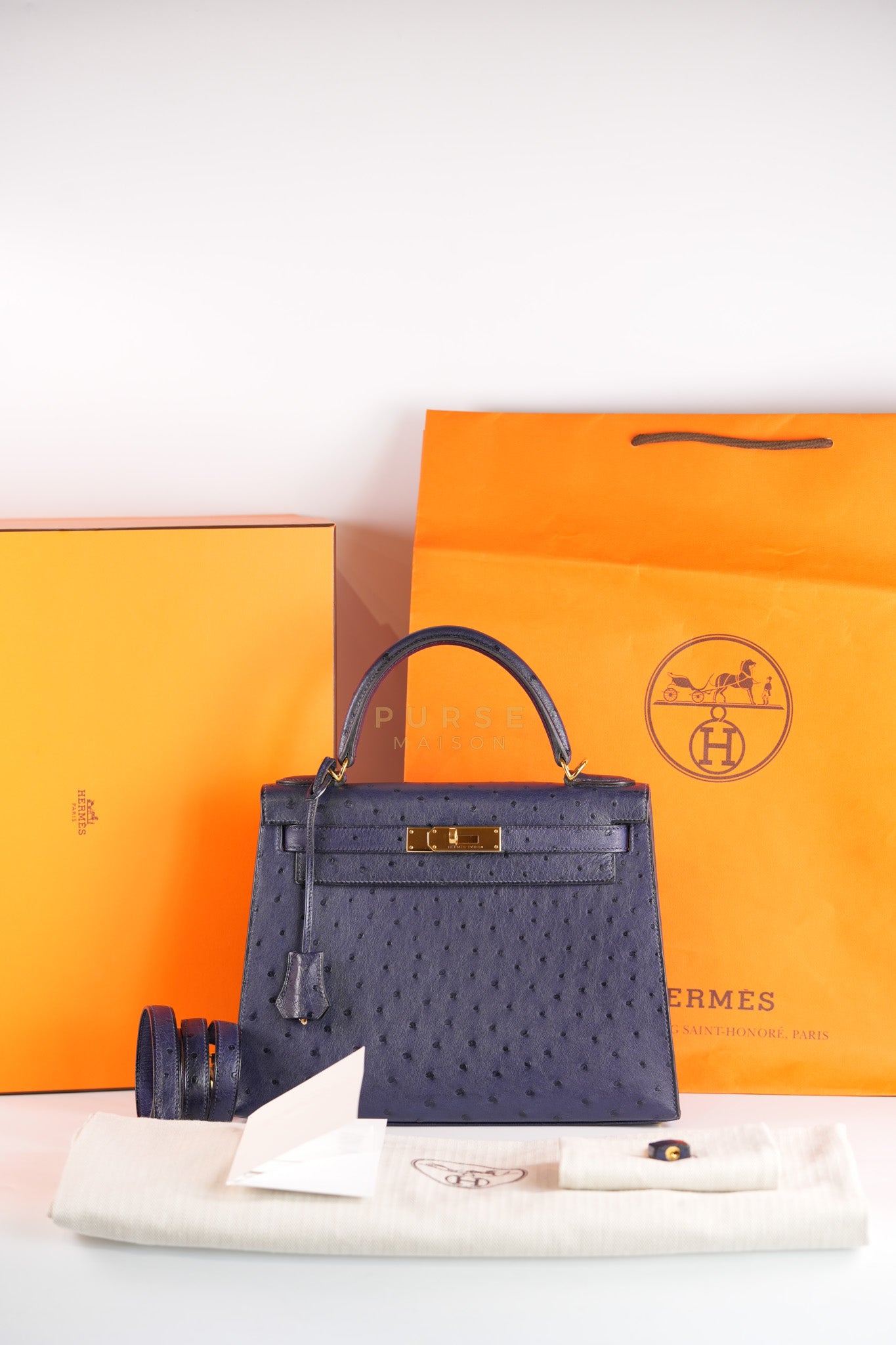 Kelly 28 Sellier in Blue Iris Ostrich Leather and Gold Hardware Stamp T (2015) | Purse Maison Luxury Bags Shop