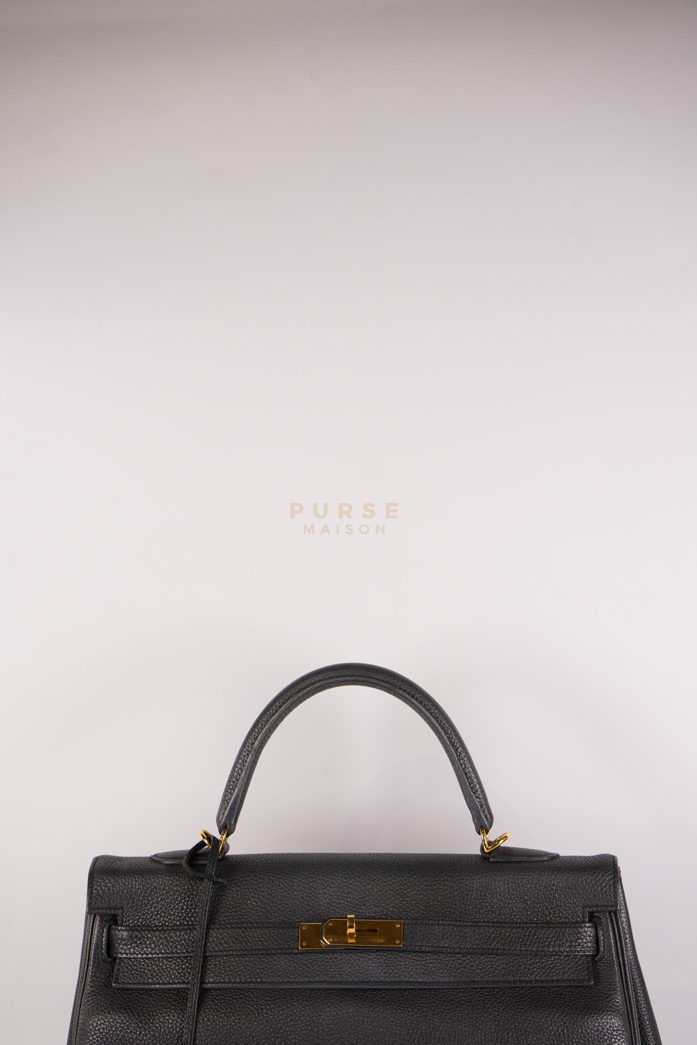 Kelly 35 Retourne Black in Togo Leather and Gold Hardware Stamp Square Q (2013) | Purse Maison Luxury Bags Shop