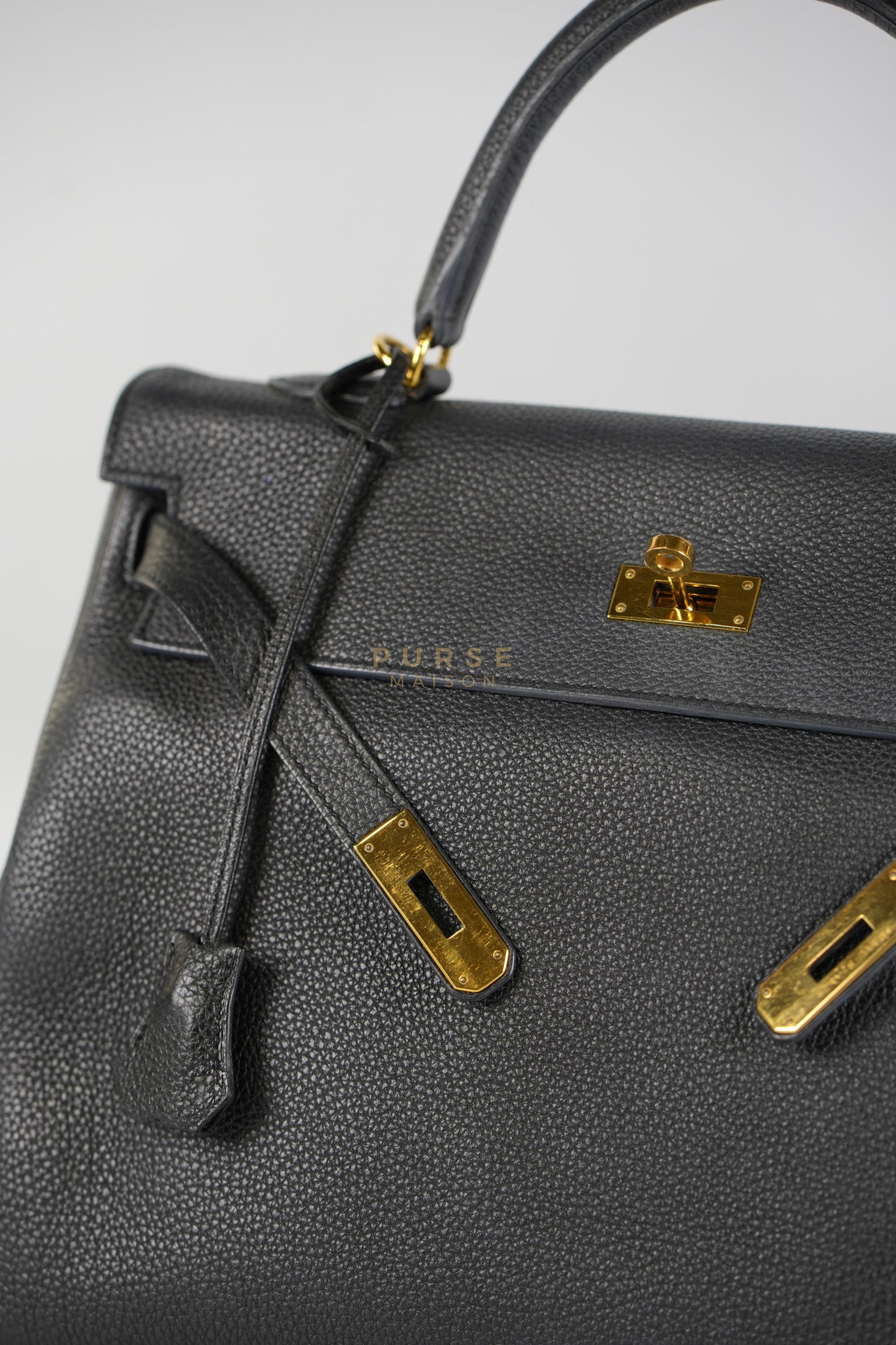 Kelly 35 Retourne Black in Togo Leather and Gold Hardware Stamp Square Q (2013) | Purse Maison Luxury Bags Shop