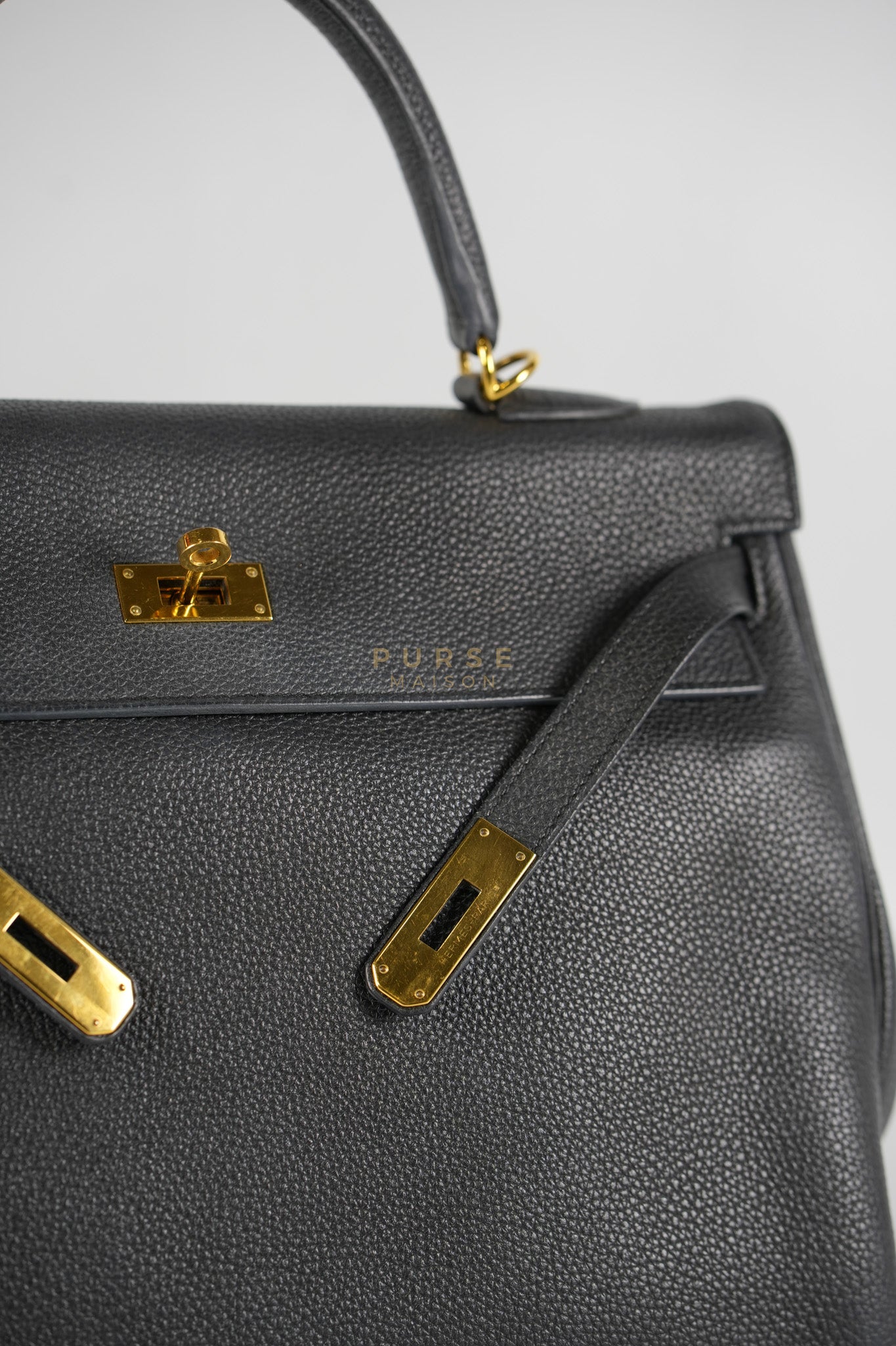 Kelly 35 Retourne Black in Togo Leather and Gold Hardware Stamp Square Q (2013) | Purse Maison Luxury Bags Shop