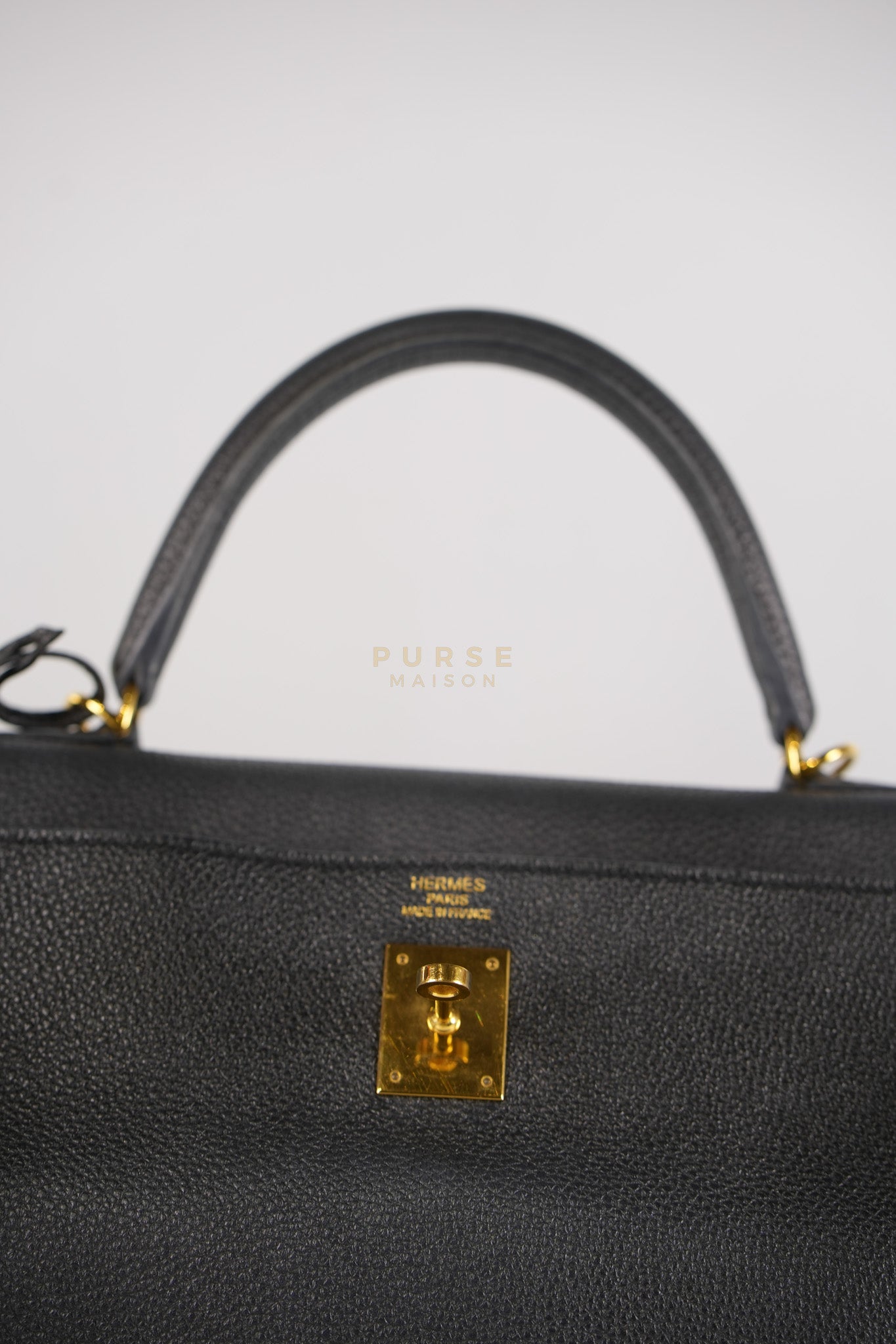 Kelly 35 Retourne Black in Togo Leather and Gold Hardware Stamp Square Q (2013) | Purse Maison Luxury Bags Shop