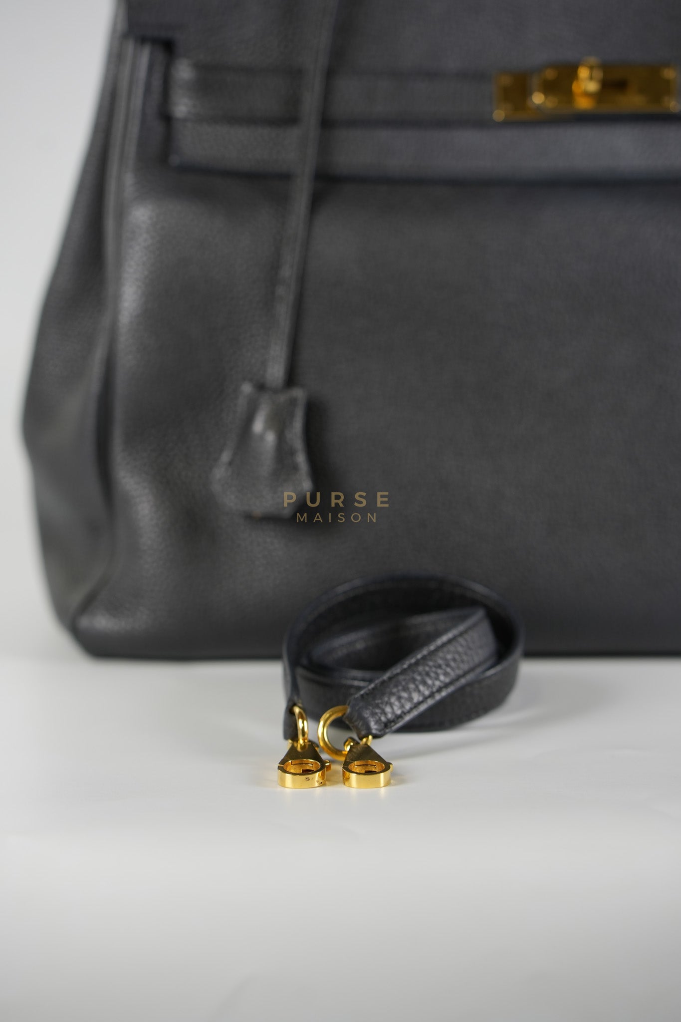 Kelly 35 Retourne Black in Togo Leather and Gold Hardware Stamp Square Q (2013) | Purse Maison Luxury Bags Shop