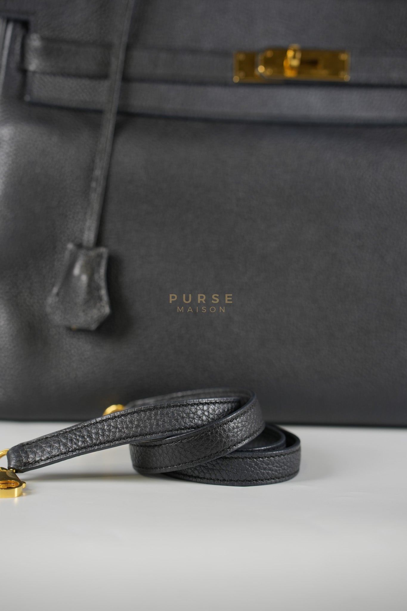 Kelly 35 Retourne Black in Togo Leather and Gold Hardware Stamp Square Q (2013) | Purse Maison Luxury Bags Shop