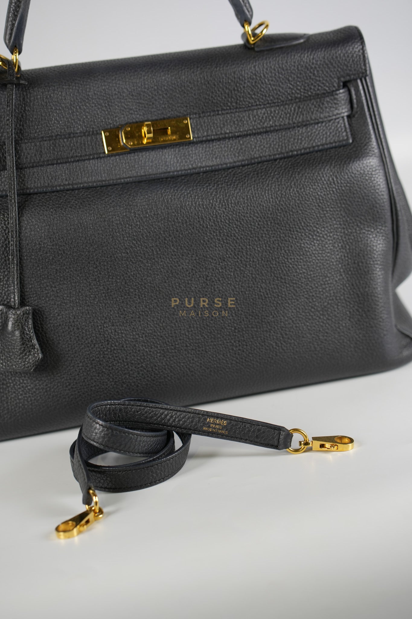 Kelly 35 Retourne Black in Togo Leather and Gold Hardware Stamp Square Q (2013) | Purse Maison Luxury Bags Shop