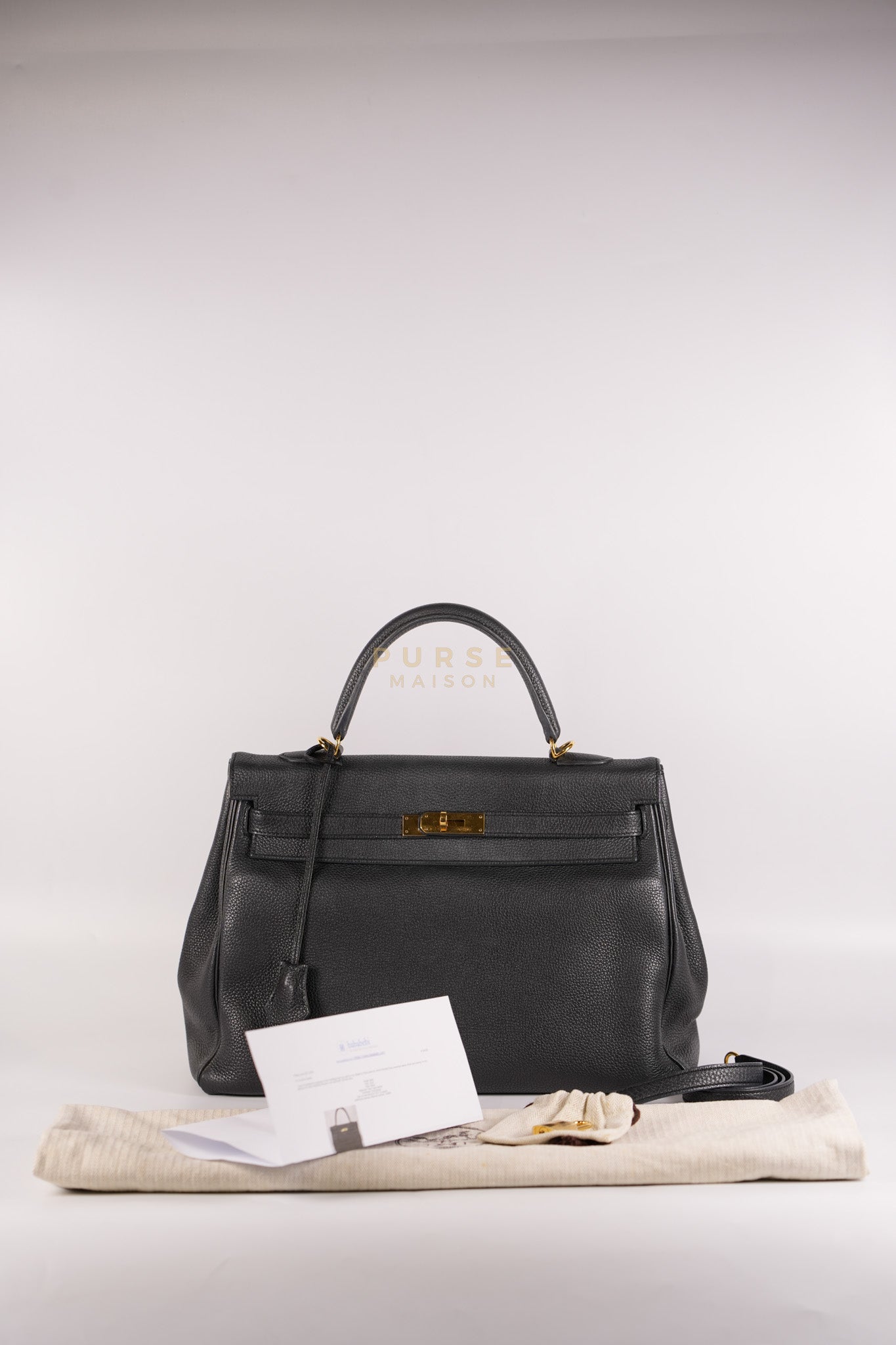 Kelly 35 Retourne Black in Togo Leather and Gold Hardware Stamp Square Q (2013) | Purse Maison Luxury Bags Shop