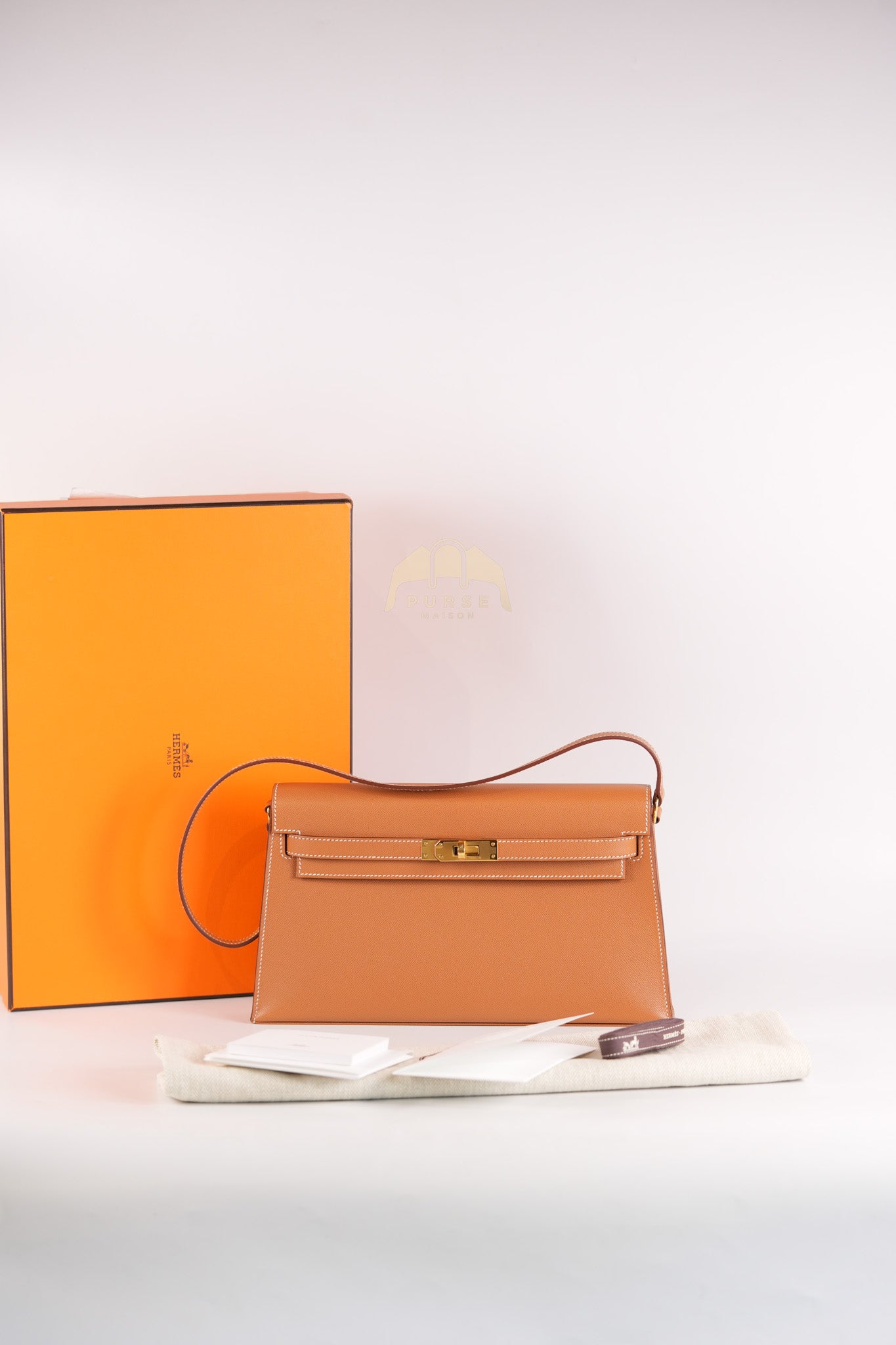 Kelly Elan in Gold in Veau Madame Leather and Gold Hardware Stamp B (2023) | Purse Maison Luxury Bags Shop