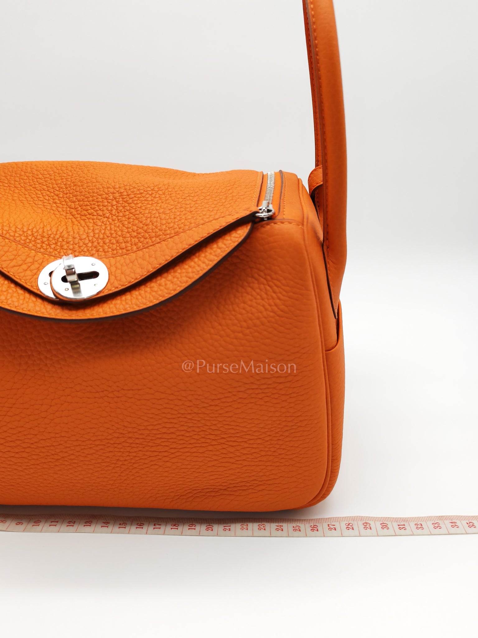 Lindy 26 in Orange Clemence Leather and Palladium Hardware Stamp B (2023) | Purse Maison Luxury Bags Shop