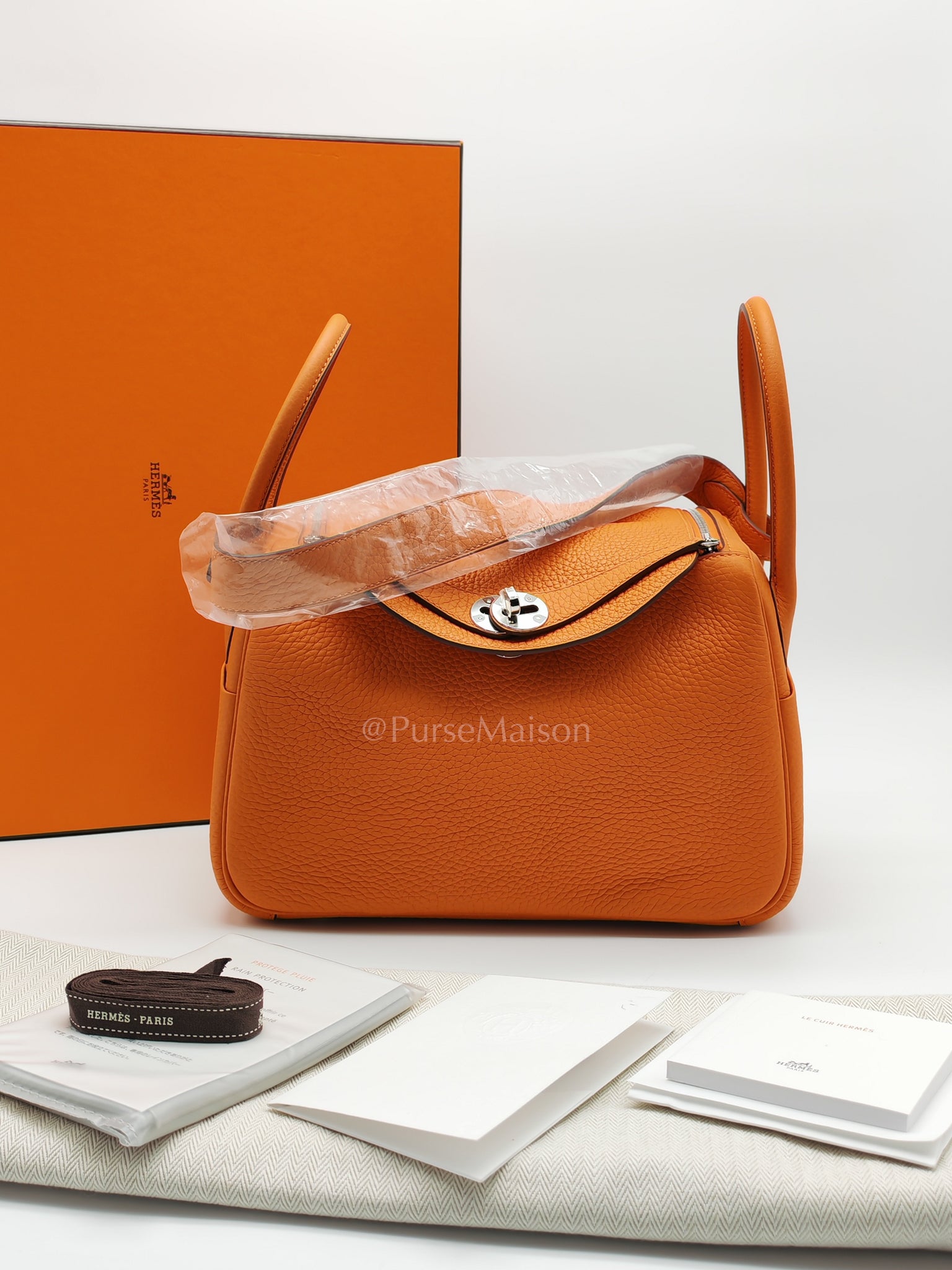 Lindy 26 in Orange Clemence Leather and Palladium Hardware Stamp B (2023) | Purse Maison Luxury Bags Shop