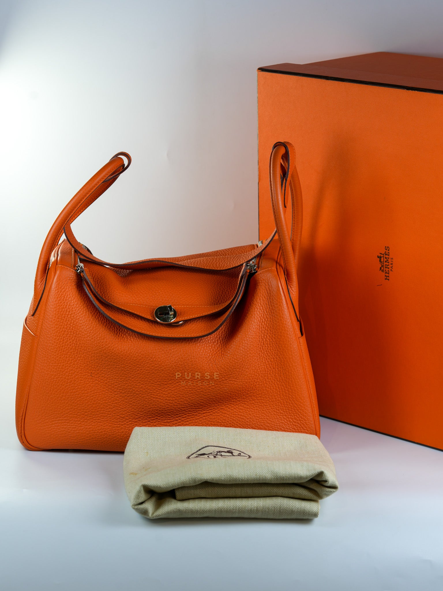 Lindy 34 Orange Clemence Leather and Palladium Hardware Stamp Square O (2011) | Purse Maison Luxury Bags Shop