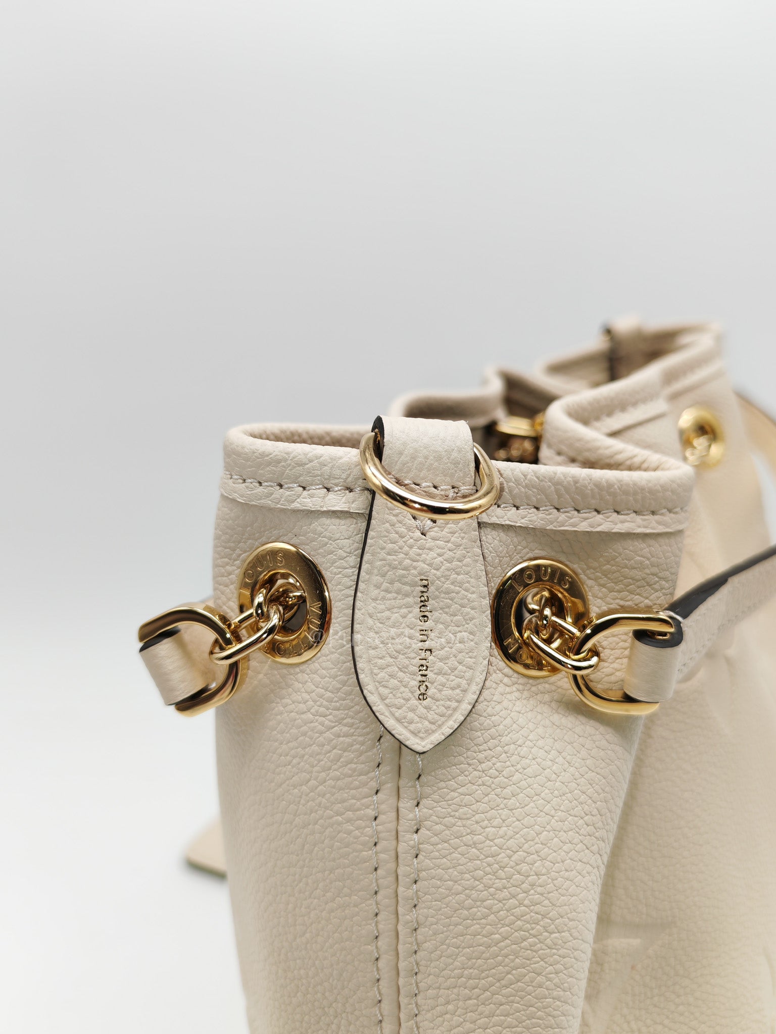 Louis Vuitton Bundle Bag in Cream Monogram Empreinte Giant and Gold Hardware Microchip | Purse Maison Luxury Bags Shop