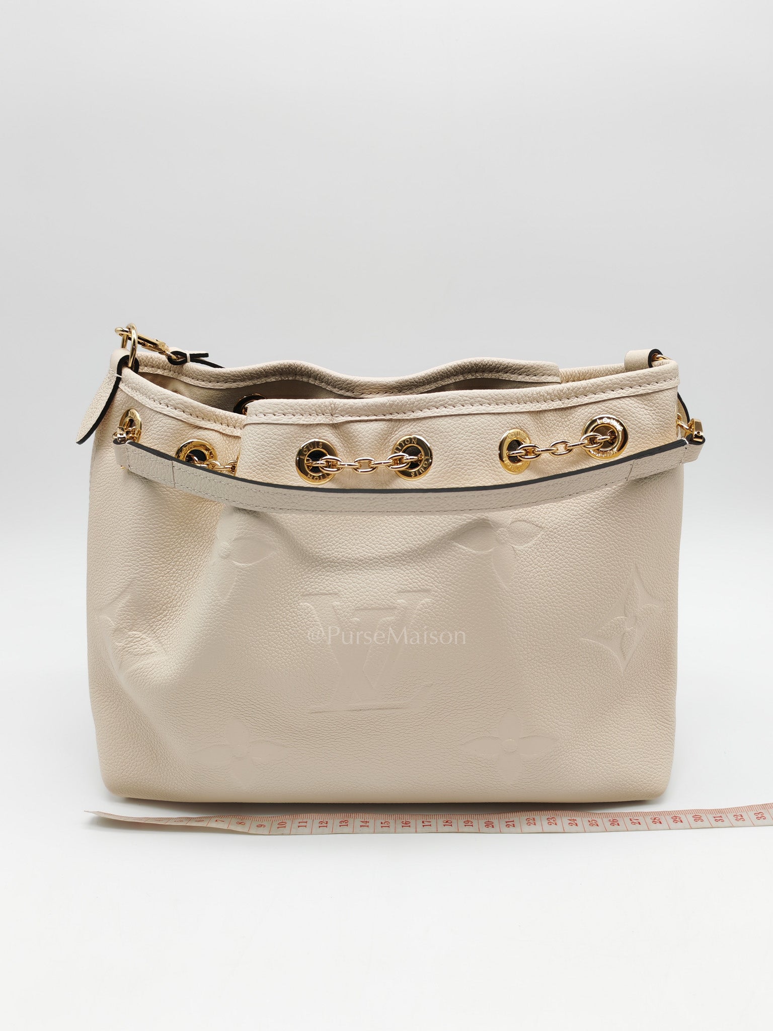 Louis Vuitton Bundle Bag in Cream Monogram Empreinte Giant and Gold Hardware Microchip | Purse Maison Luxury Bags Shop