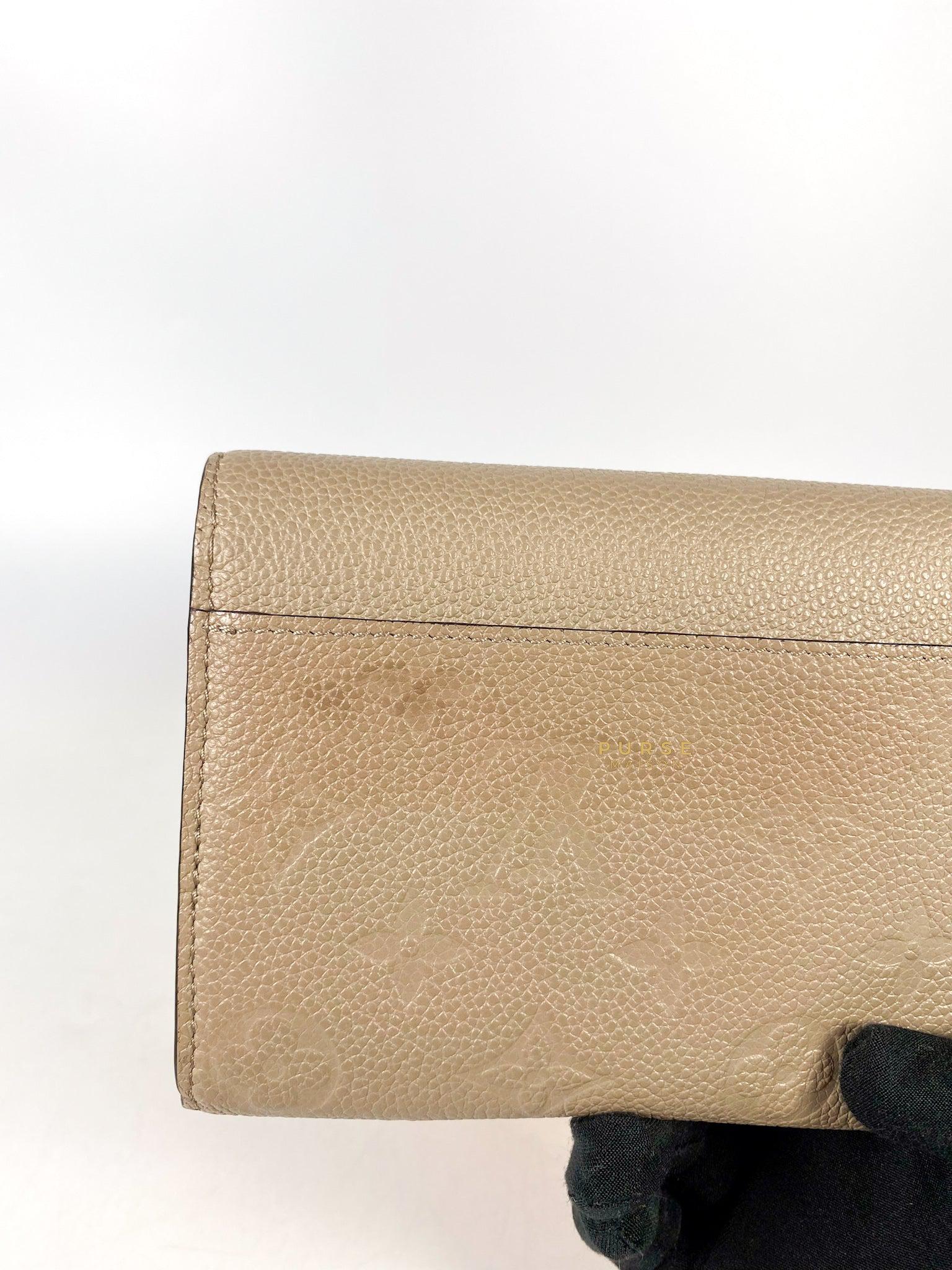 Louis Vuitton Sarah Wallet in Turtledove Monogram Empreinte Canvas (microchip)