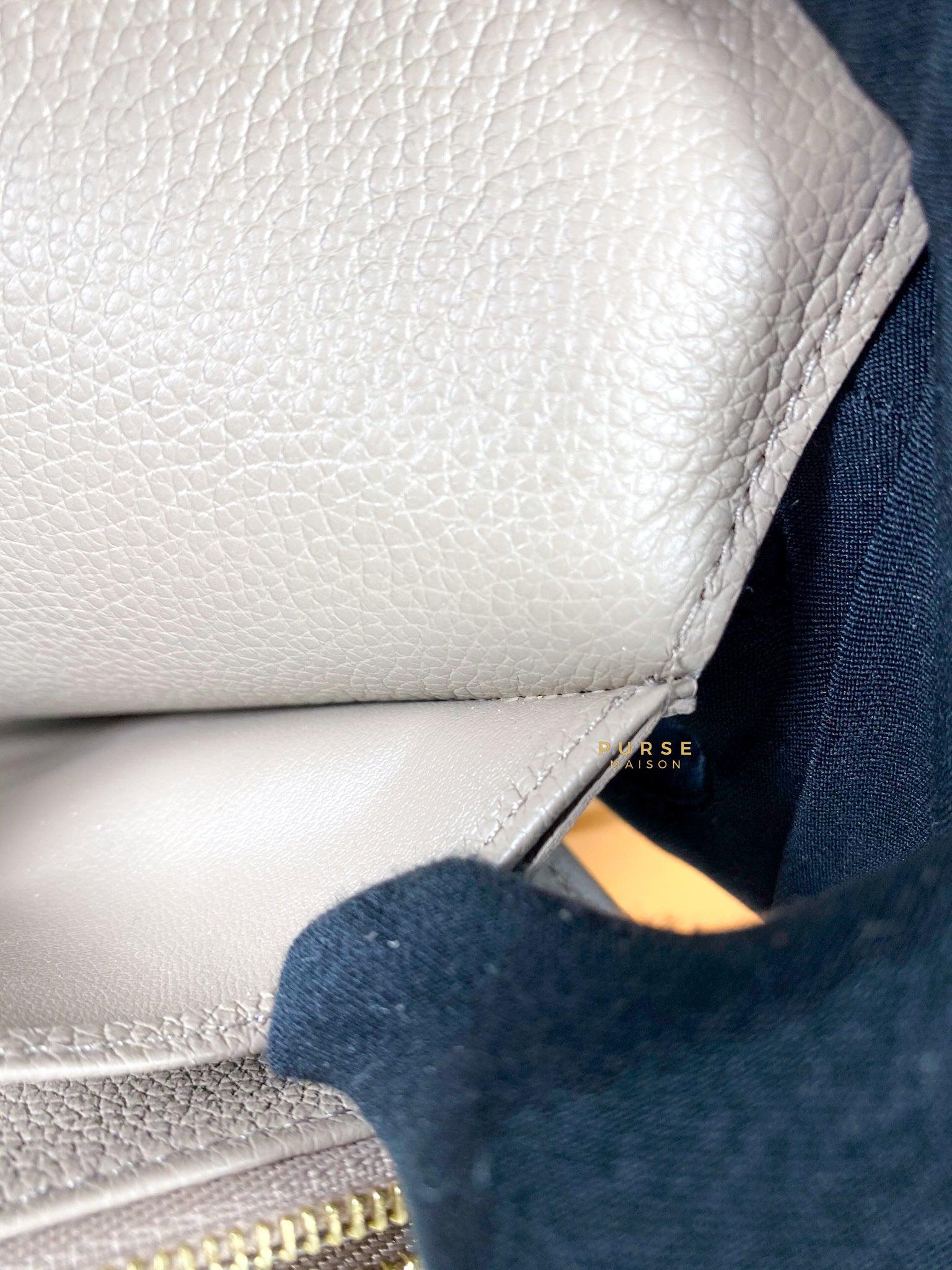 Louis Vuitton Sarah Wallet in Turtledove Monogram Empreinte Canvas (microchip)