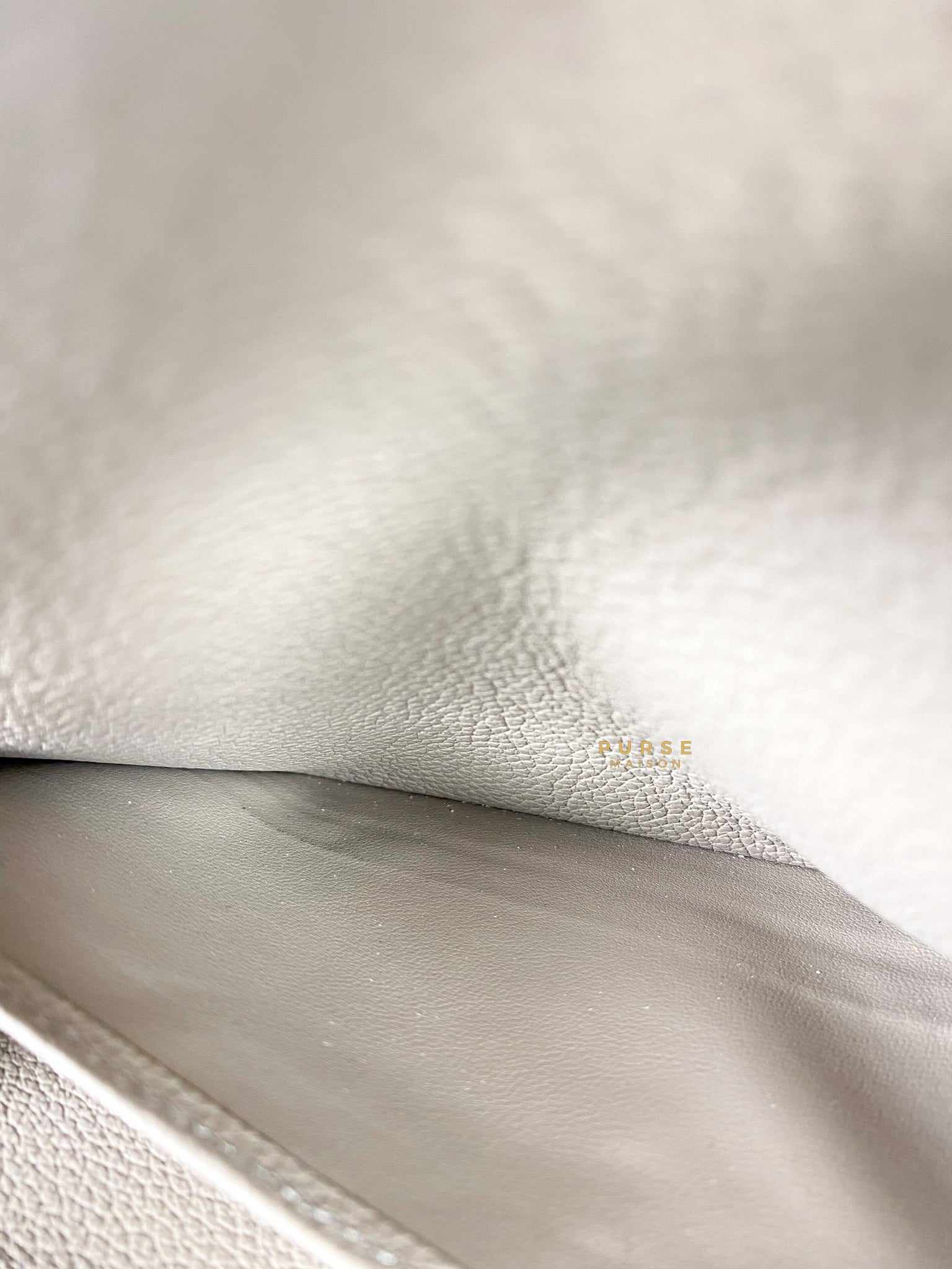 Louis Vuitton Sarah Wallet in Turtledove Monogram Empreinte Canvas (microchip)