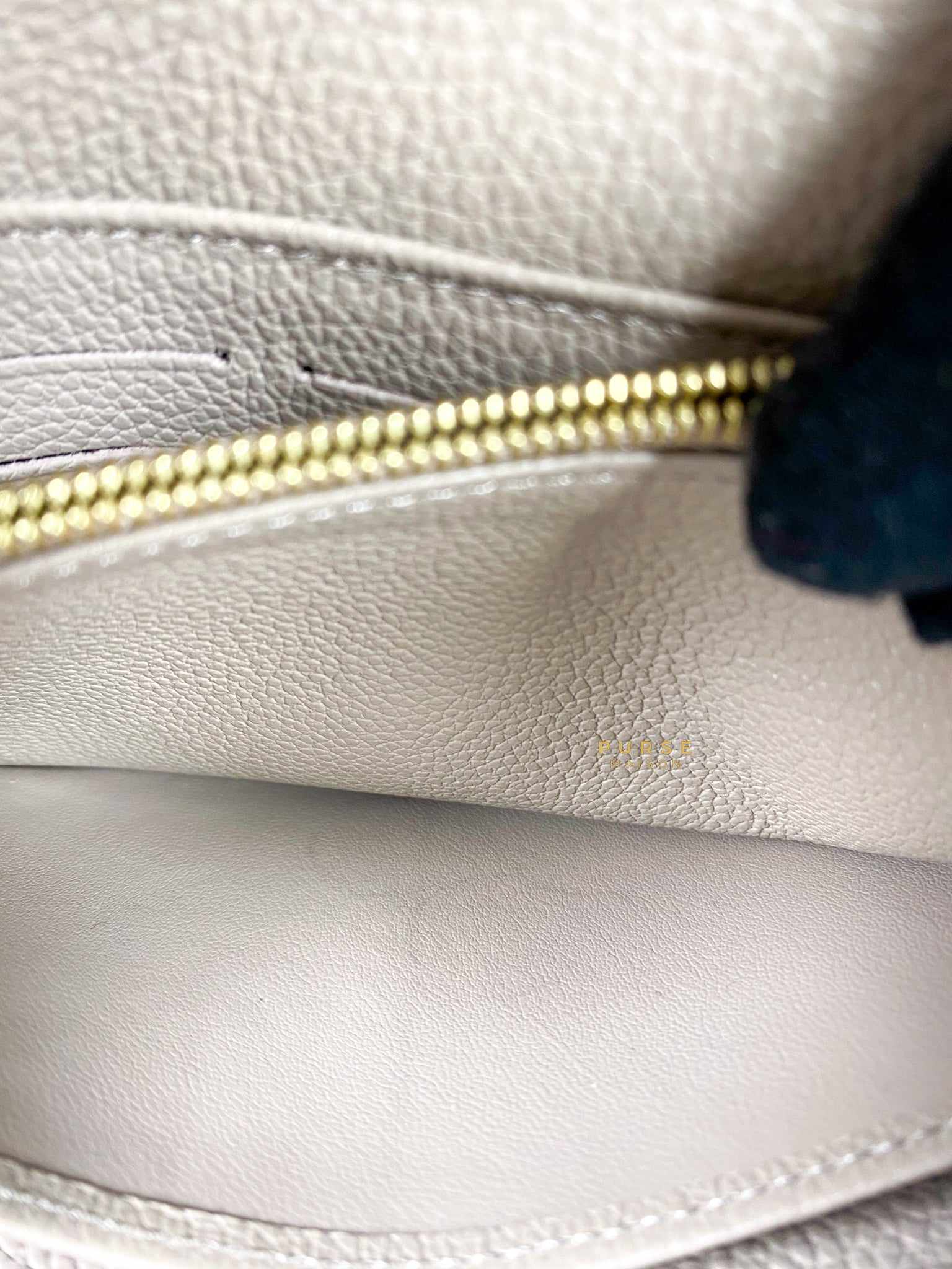 Louis Vuitton Sarah Wallet in Turtledove Monogram Empreinte Canvas (microchip)