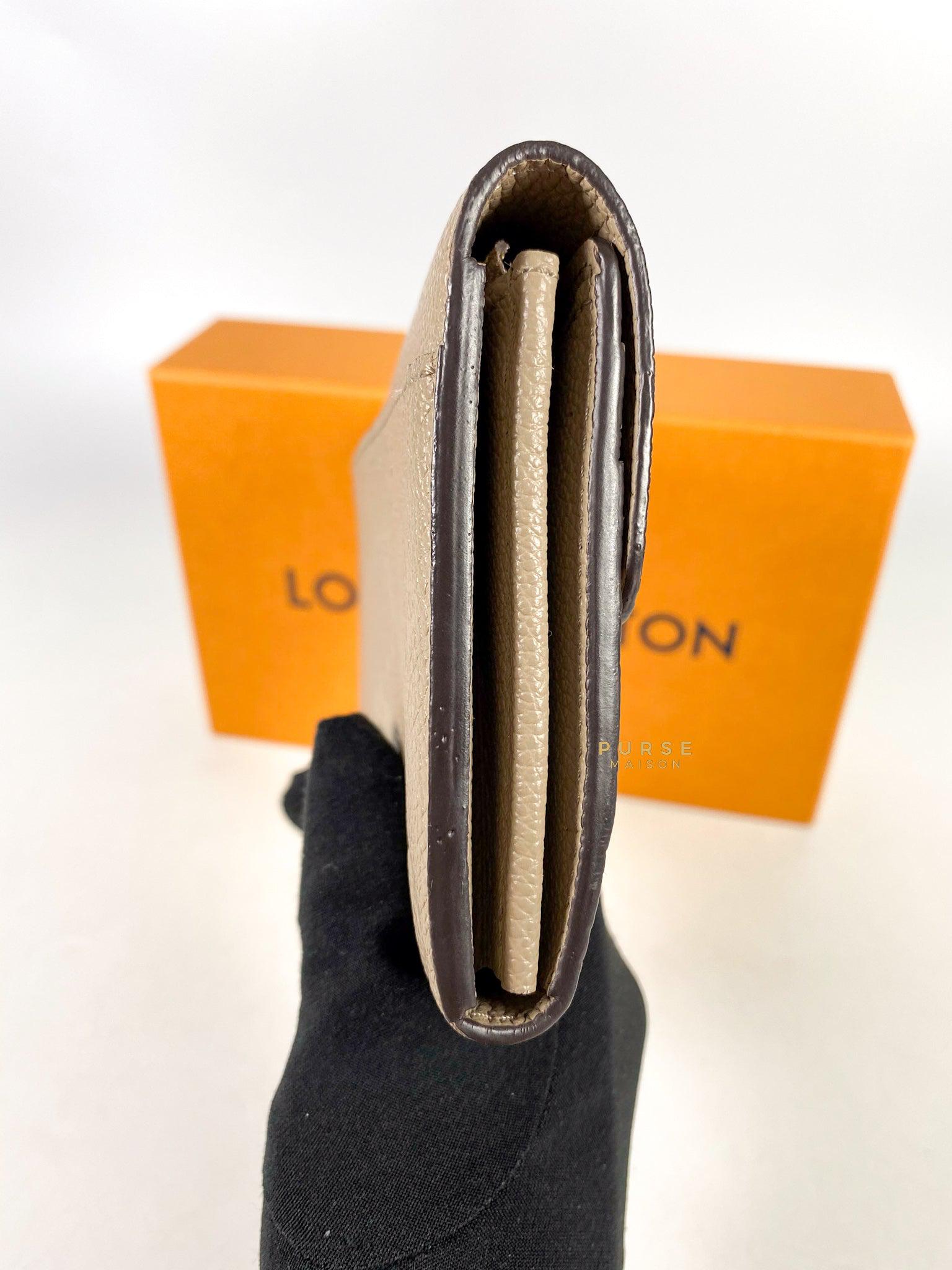 Louis Vuitton Sarah Wallet in Turtledove Monogram Empreinte Canvas (microchip)