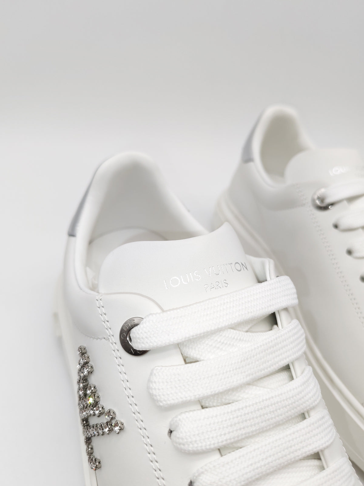 Louis Vuitton Time Out Sneaker in White with Silver Rhinestone Logo Size 38 EU (25.5 cm) | Purse Maison Luxury Bags Shop