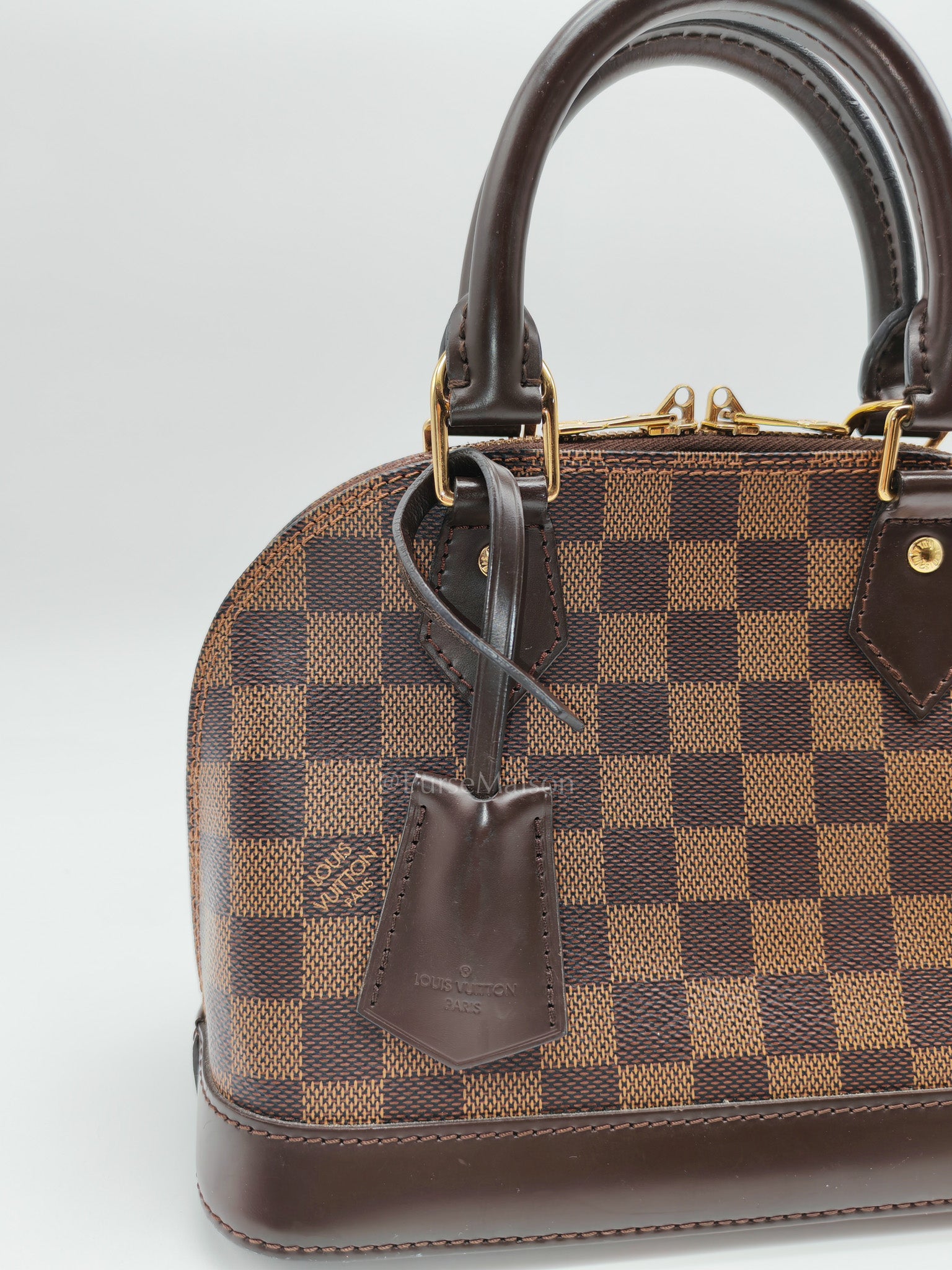 Alma BB in Damier Ebene Canvas (Microchip)