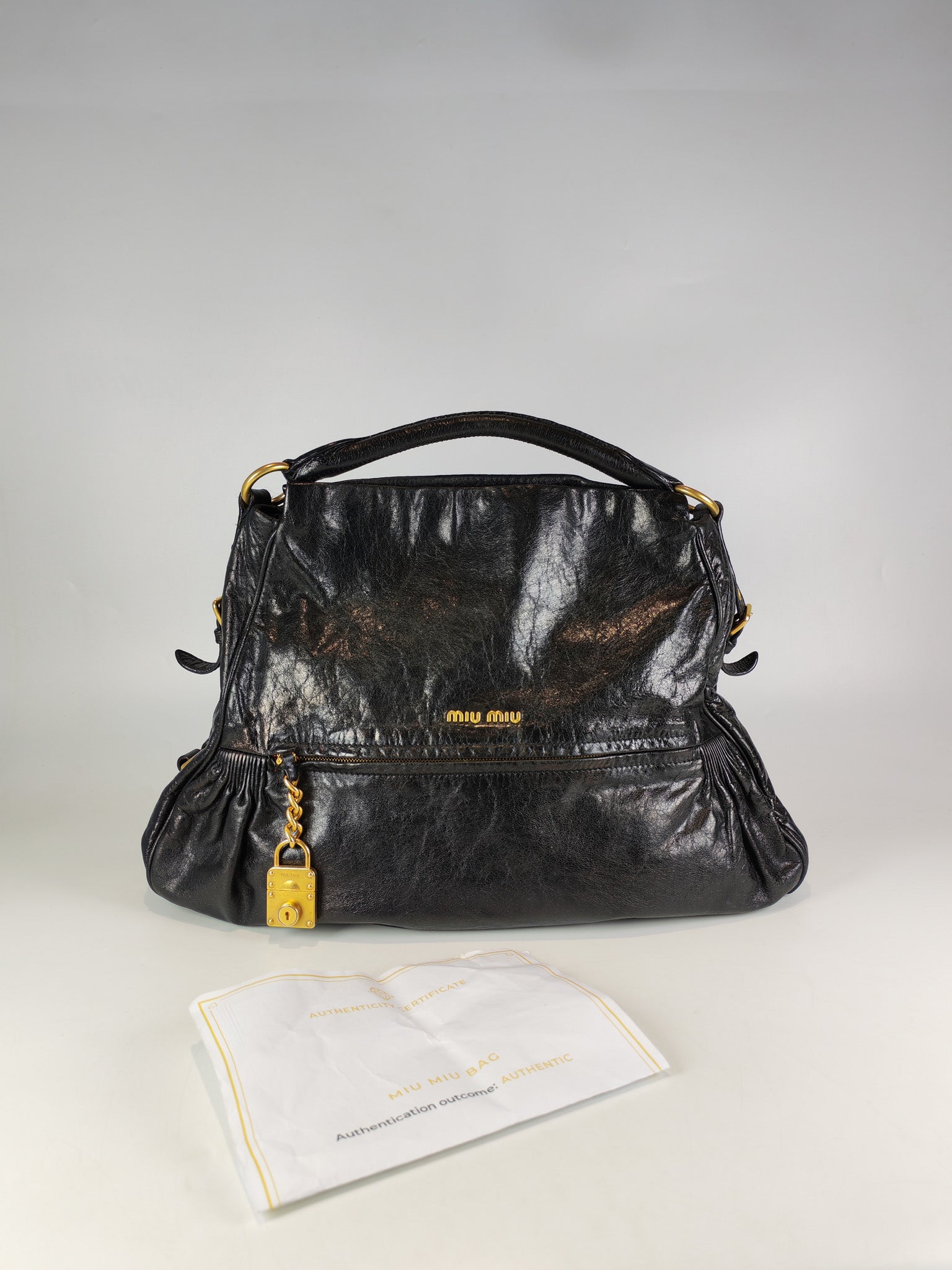 Madras “Lock” Top Handle Bag in Black Leather | Purse Maison Luxury Bags Shop