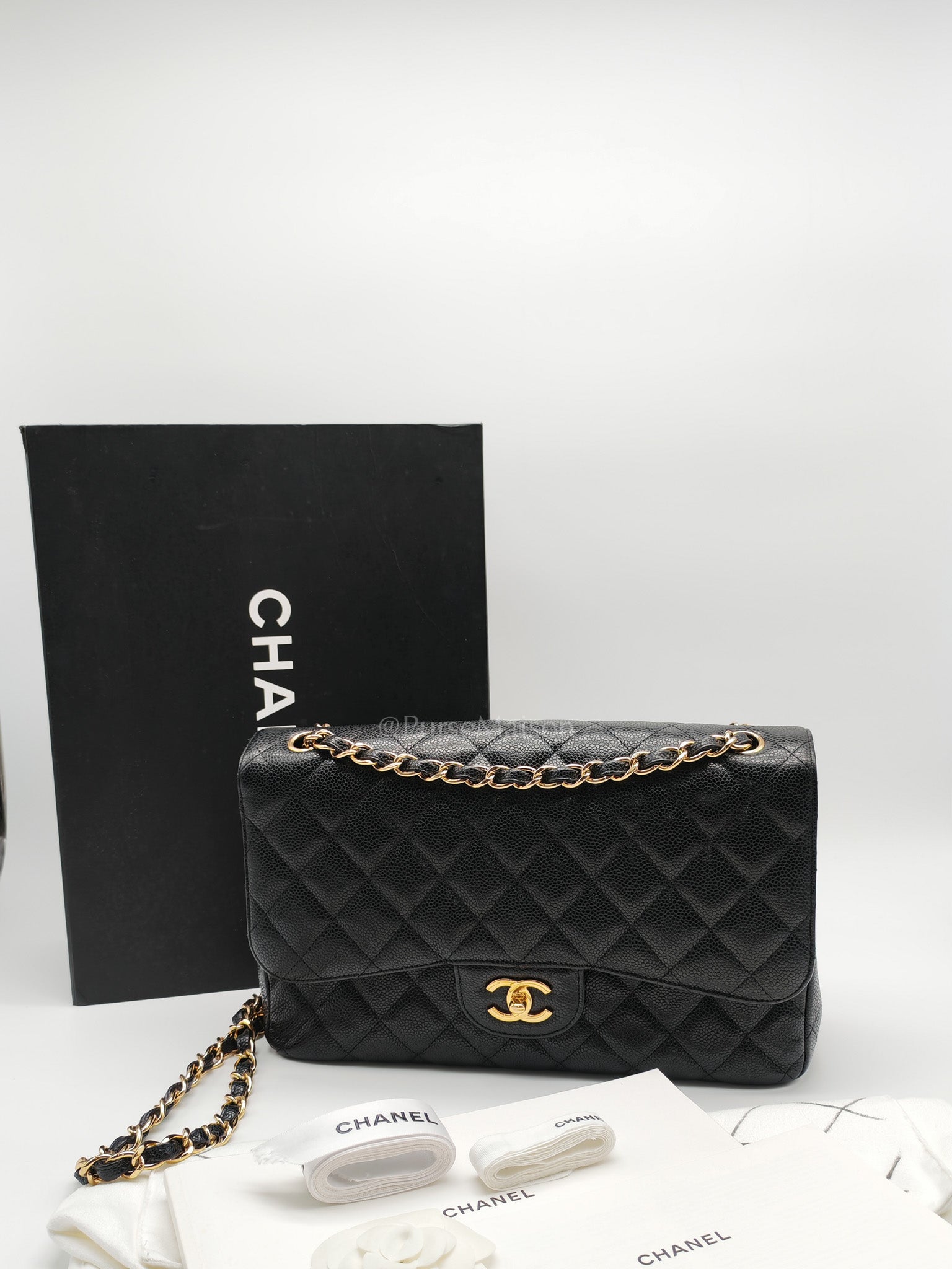 Classic Double Flap Jumbo In Black Caviar Leather and Gold Hardware Series 15