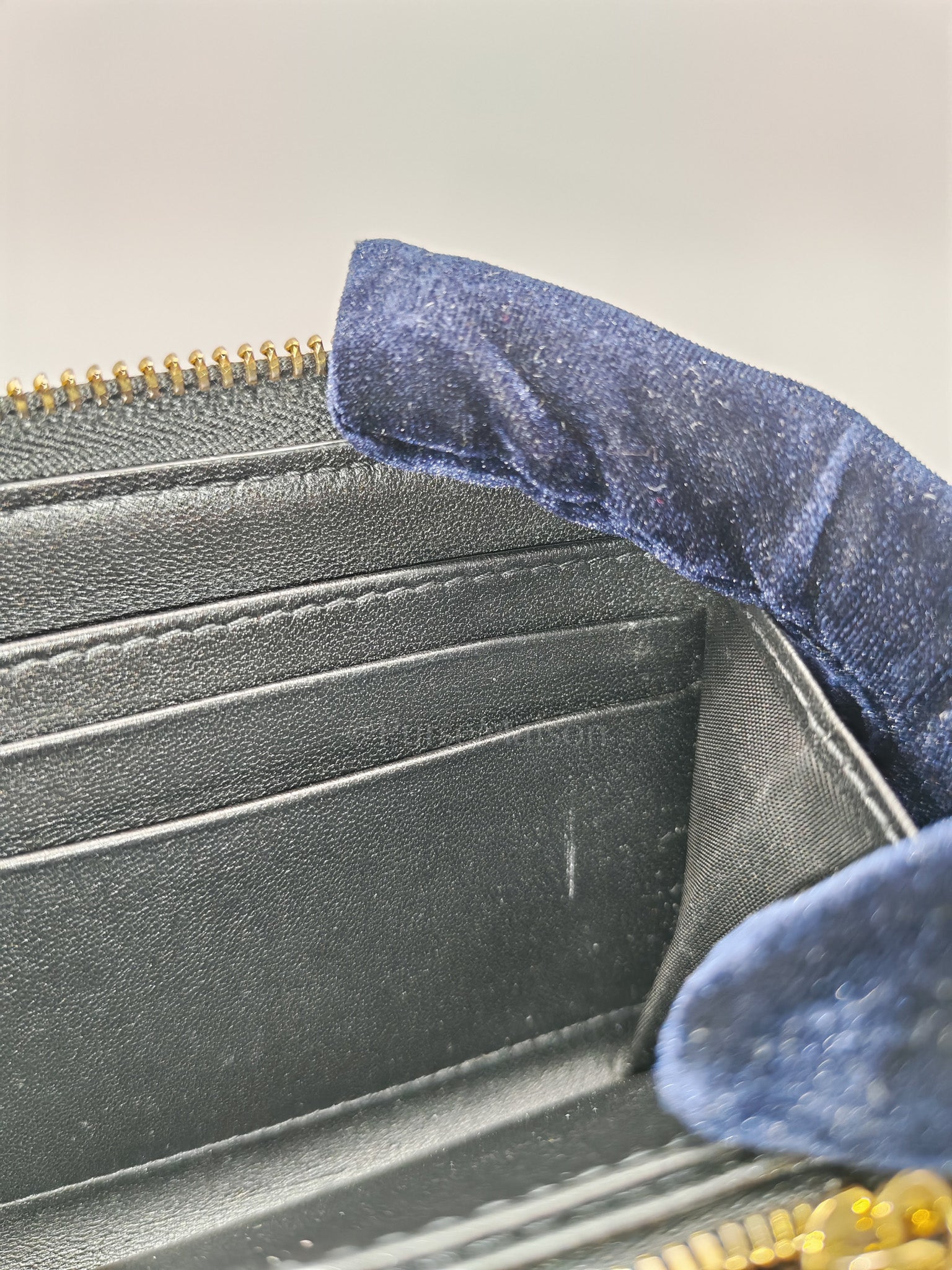 Voyaguer in Black Cannage Lambskin Leather Long Zip Wallet