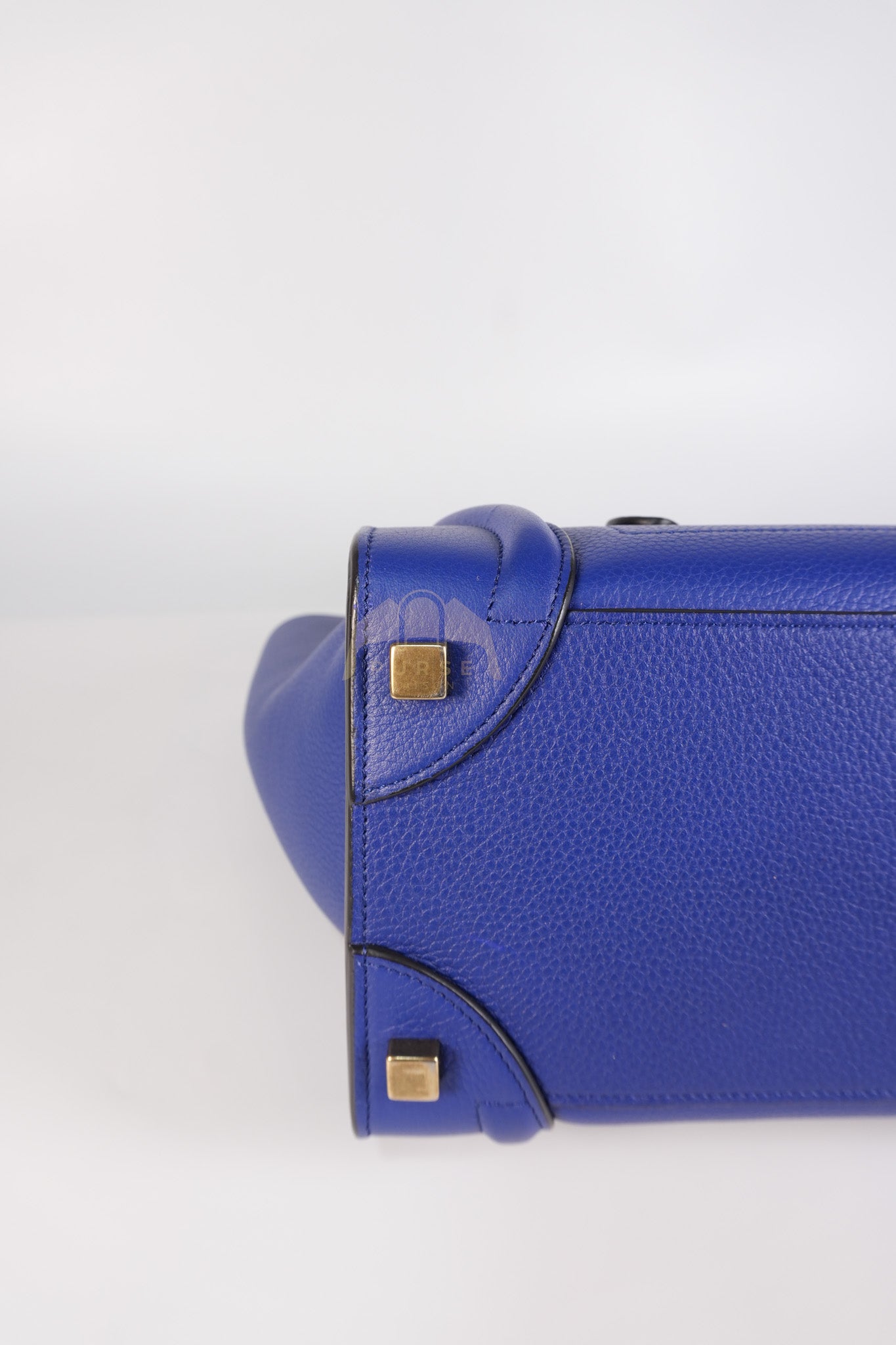 Micro Luggage in Blue Drummed Calfskin Leather | Purse Maison Luxury Bags Shop
