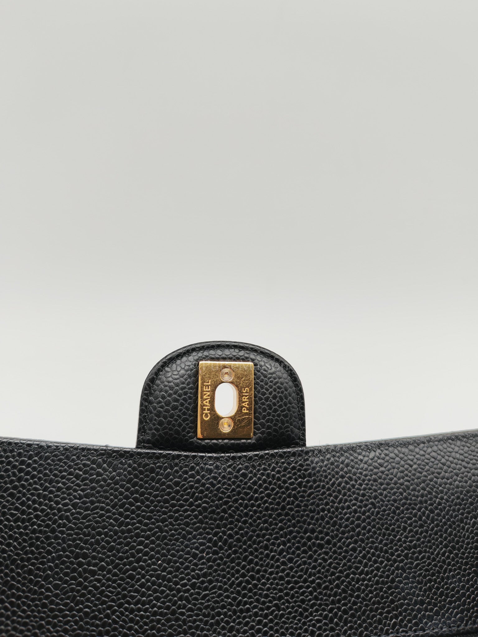Classic Double Flap Medium in Black Quilted Caviar Leather and Gold Hardware Microchip