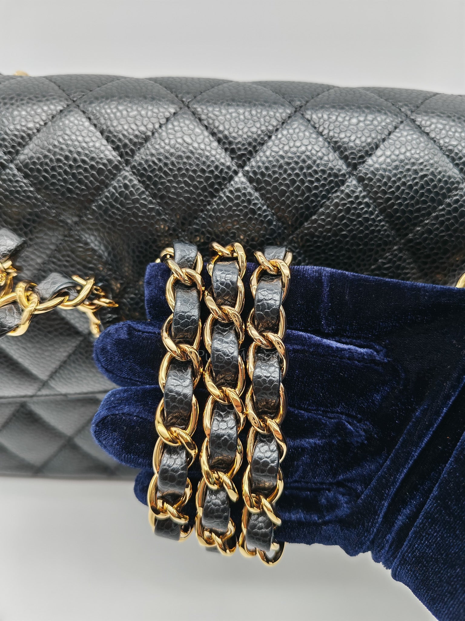 Classic Double Flap Medium in Black Quilted Caviar Leather and Gold Hardware Microchip
