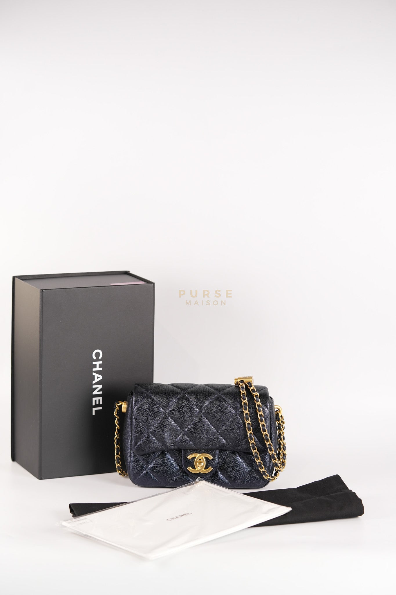 Mini Flap Bag in Iridescent Navy Blue Caviar Leather and Aged Gold Hardware (Microchip) | Purse Maison Luxury Bags Shop