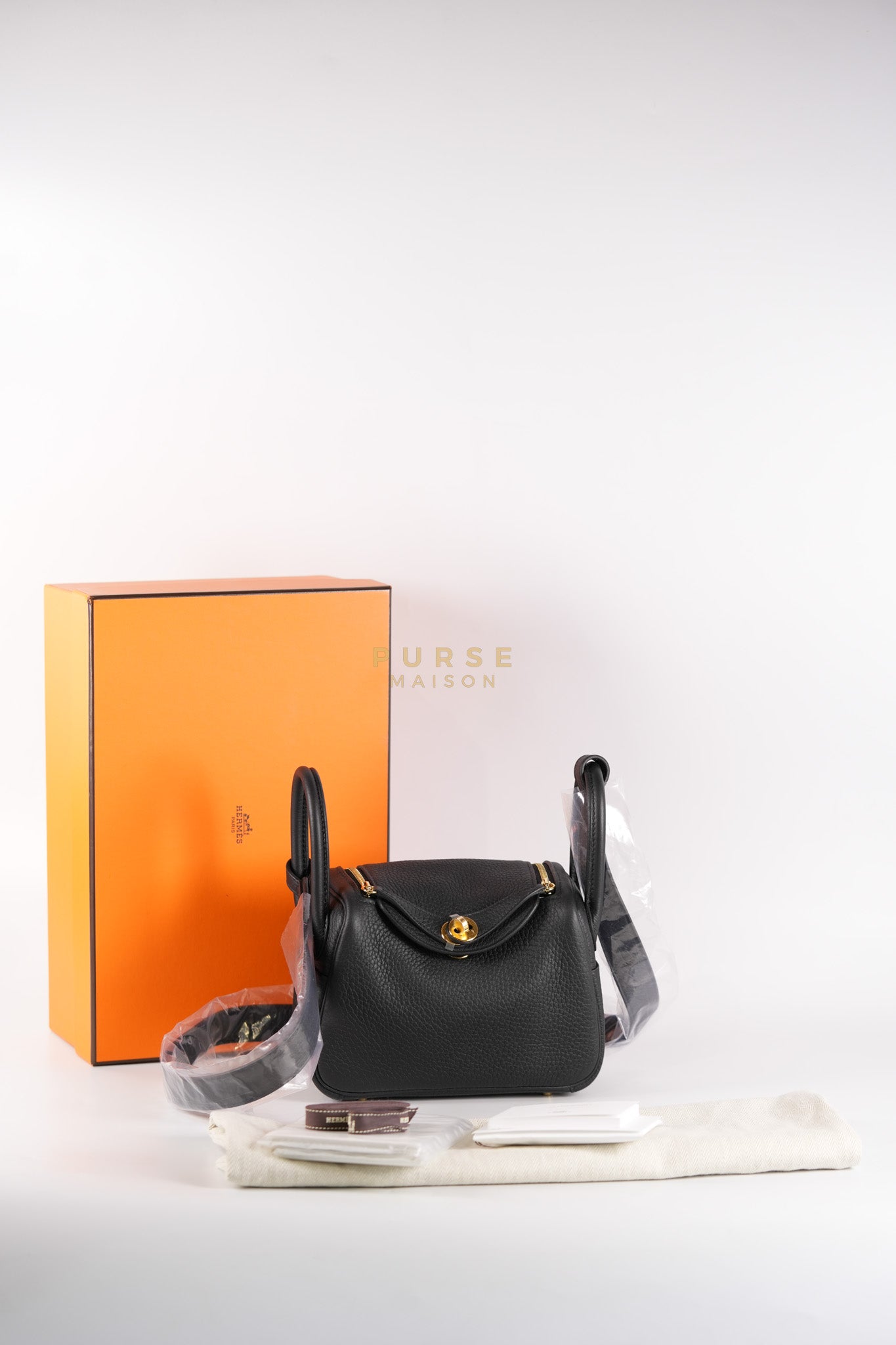 Mini Lindy Black in Togo Leather and Gold Hardware Stamp K (2025) | Purse Maison Luxury Bags Shop