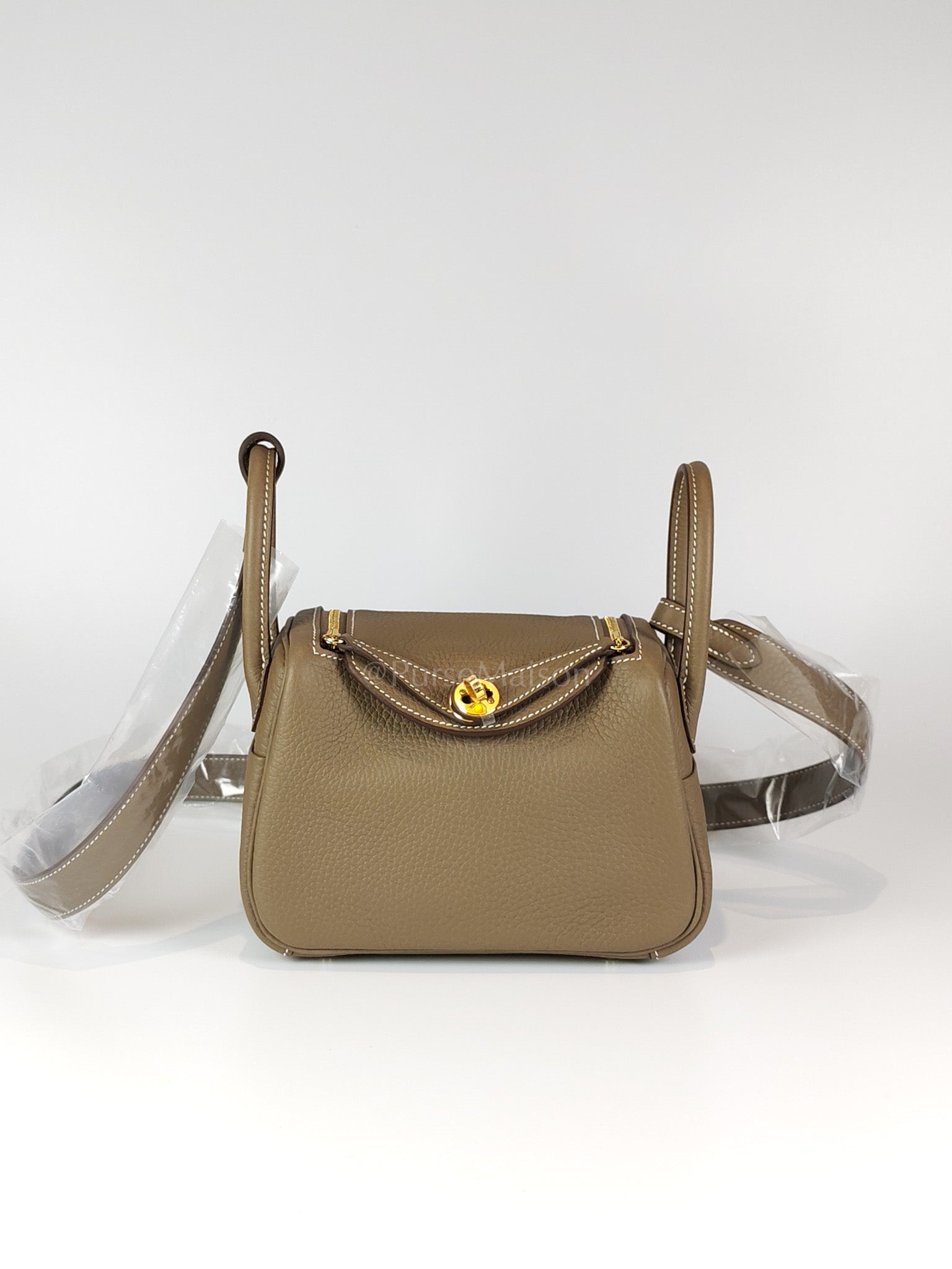 Mini Lindy in Etoupe Clemence Leather and Gold Hardware Stamp K(2025) | Purse Maison Luxury Bags Shop