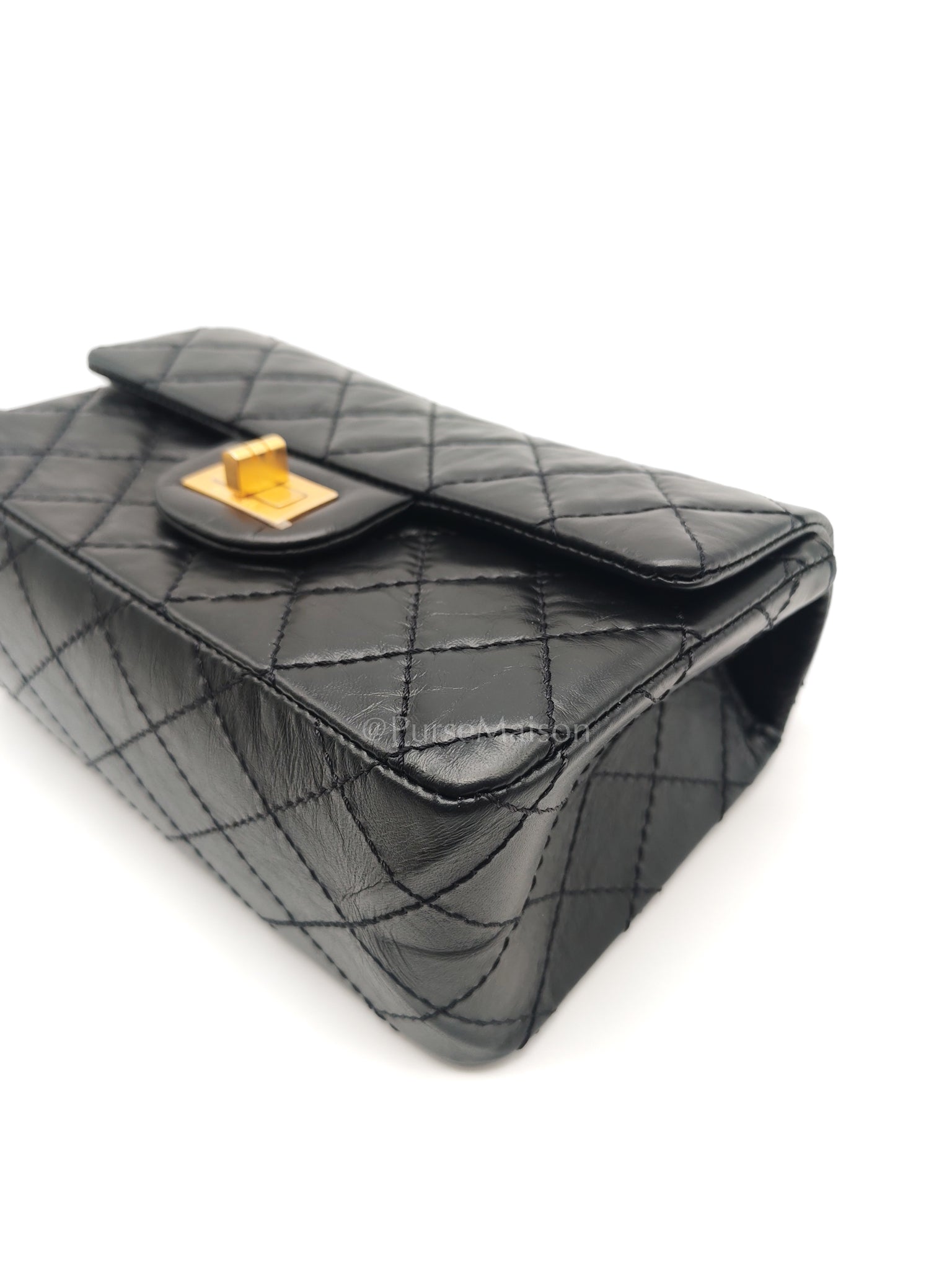 Mini Reissue 2.55 in Black Quilted Distressed Lambskin Leather and Aged Gold Hardware (Microchip) | Purse Maison Luxury Bags Shop
