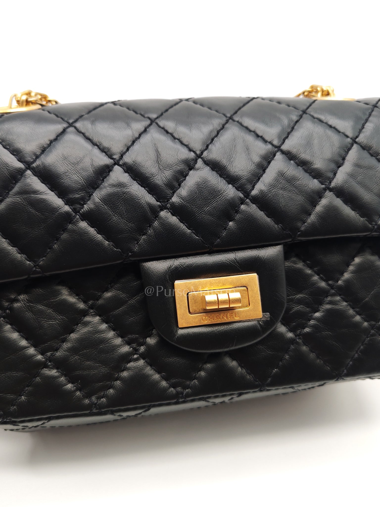 Mini Reissue 2.55 in Black Quilted Distressed Lambskin Leather and Aged Gold Hardware (Microchip) | Purse Maison Luxury Bags Shop