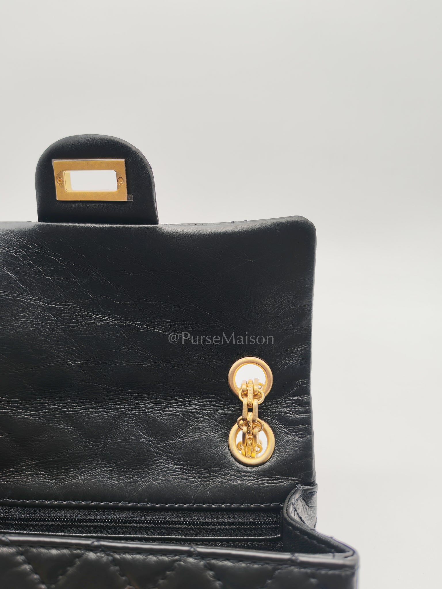 Mini Reissue 2.55 in Black Quilted Distressed Lambskin Leather and Aged Gold Hardware (Microchip) | Purse Maison Luxury Bags Shop