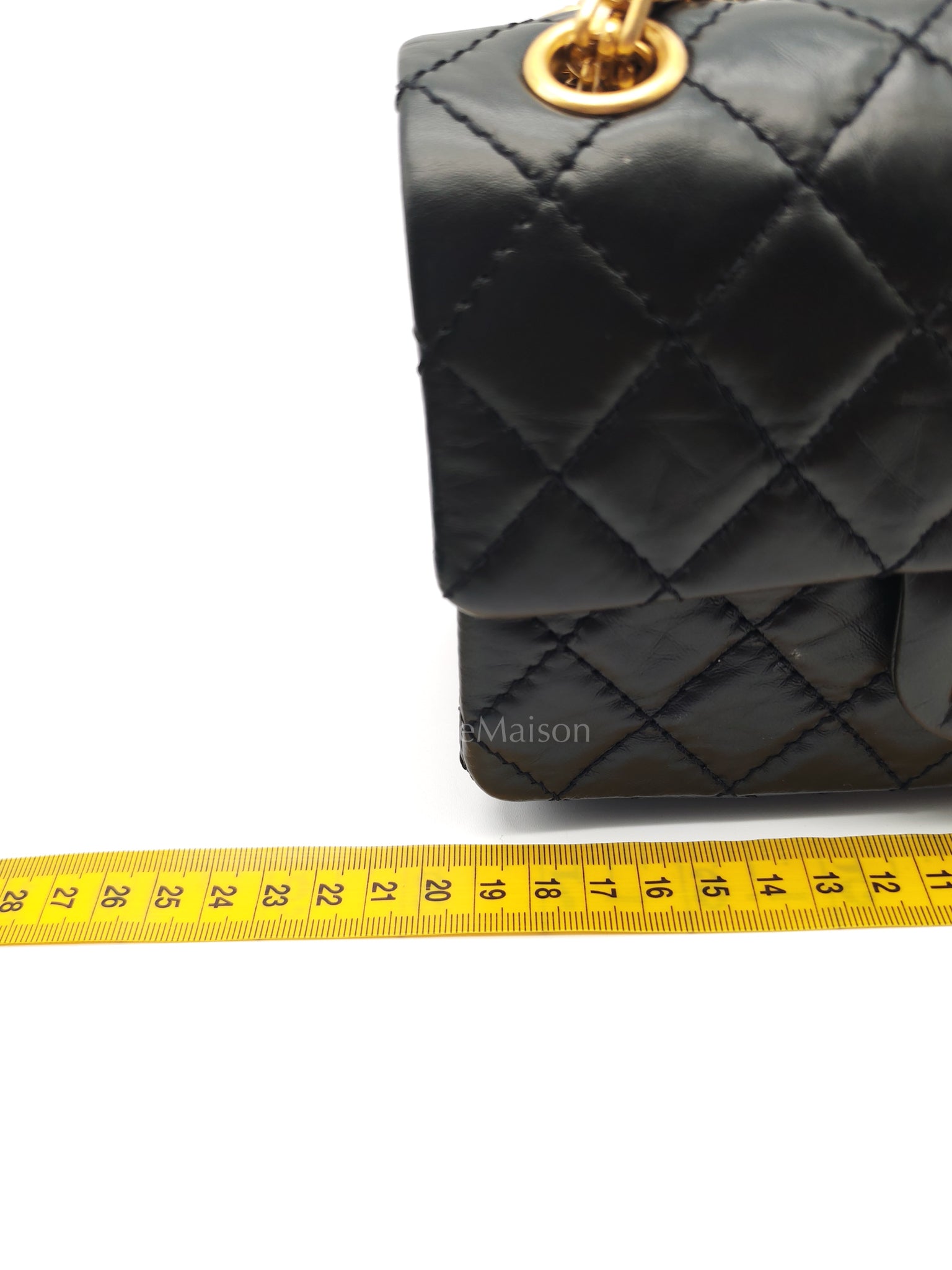 Mini Reissue 2.55 in Black Quilted Distressed Lambskin Leather and Aged Gold Hardware (Microchip) | Purse Maison Luxury Bags Shop