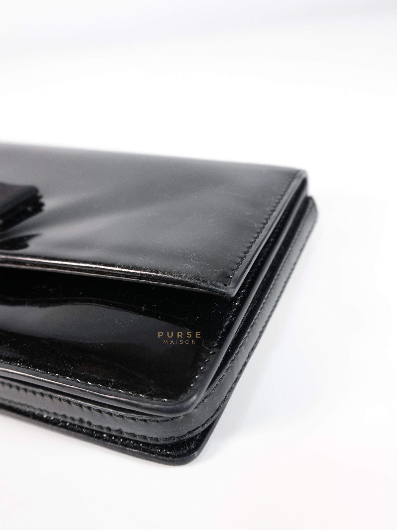 Miss Vara Bow Wristlet Clutch in Plum Patent Leather | Purse Maison Luxury Bags Shop