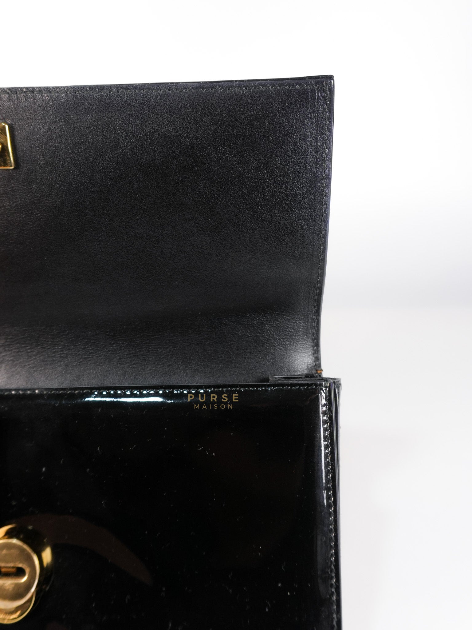 Miss Vara Bow Wristlet Clutch in Plum Patent Leather | Purse Maison Luxury Bags Shop