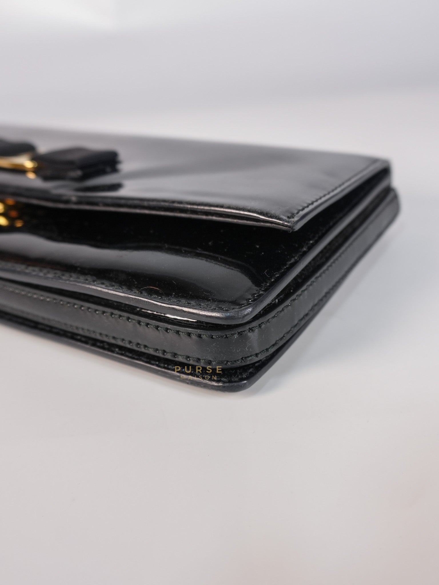 Miss Vara Bow Wristlet Clutch in Plum Patent Leather | Purse Maison Luxury Bags Shop