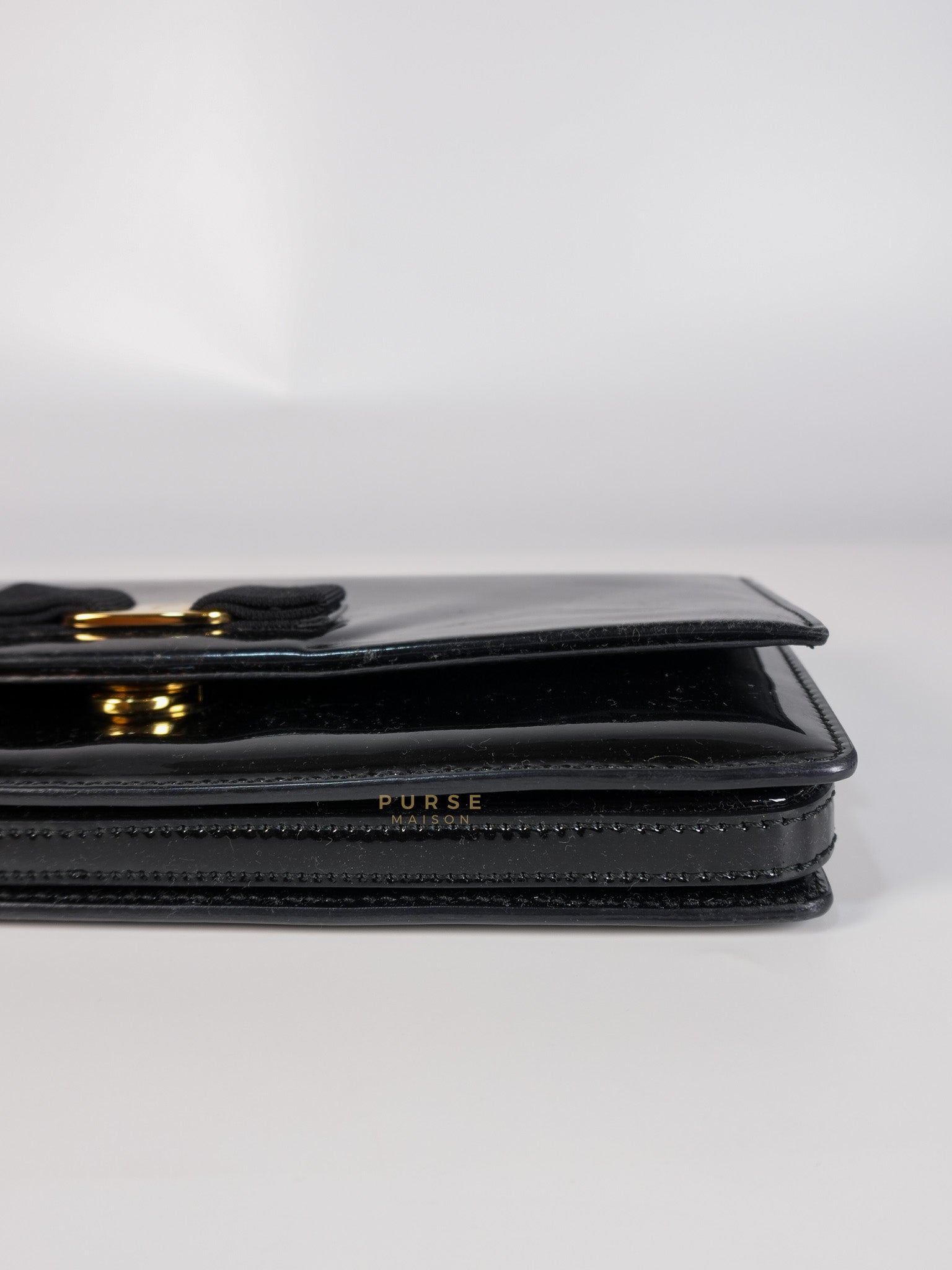 Miss Vara Bow Wristlet Clutch in Plum Patent Leather | Purse Maison Luxury Bags Shop