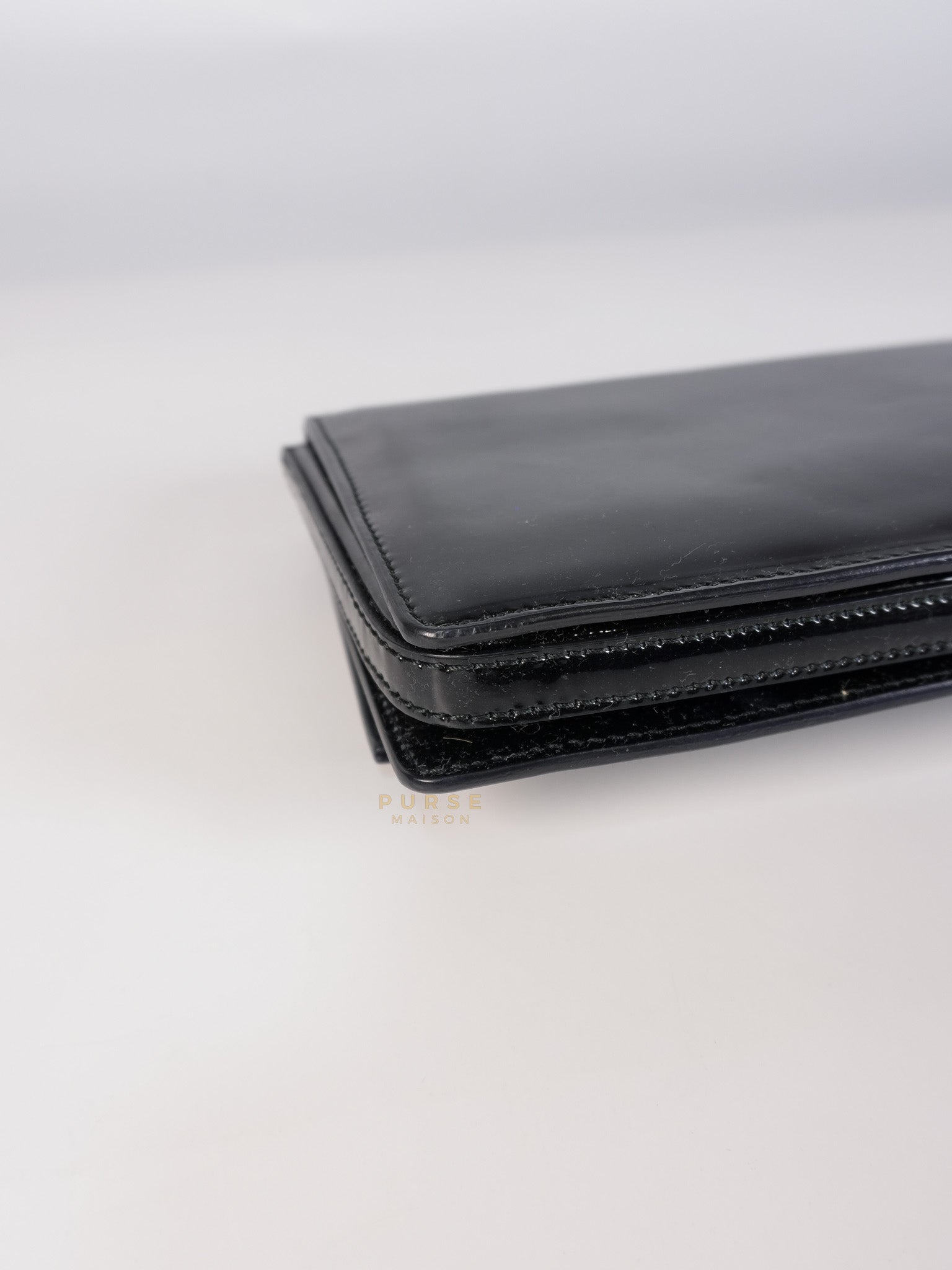 Miss Vara Bow Wristlet Clutch in Plum Patent Leather | Purse Maison Luxury Bags Shop