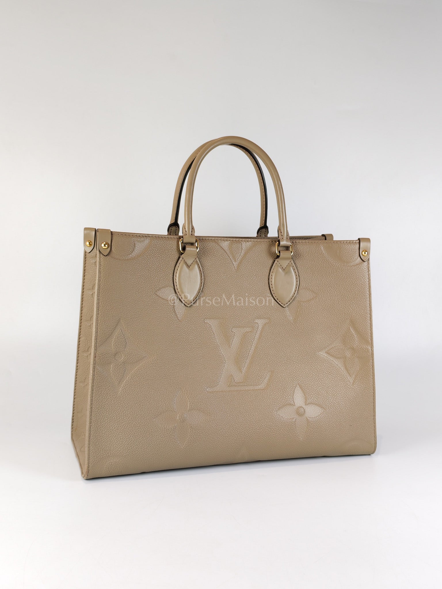 On the Go MM in Beige Monogram Empreinte Leather & Gold Hardware Microchip | Purse Maison Luxury Bags Shop