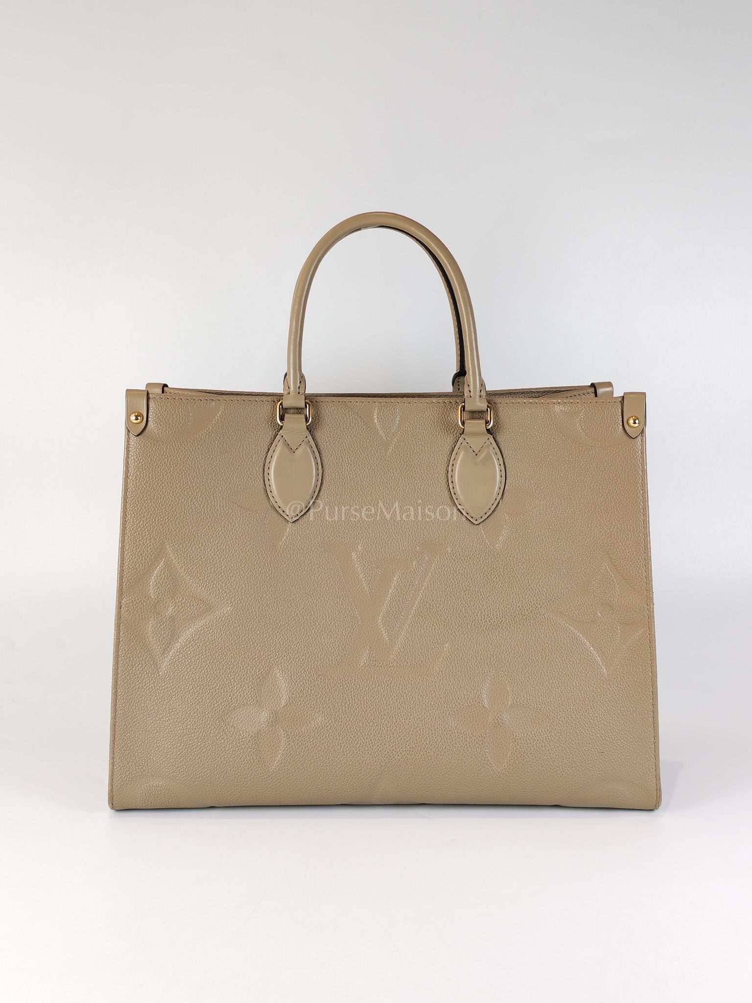 On the Go MM in Beige Monogram Empreinte Leather & Gold Hardware Microchip | Purse Maison Luxury Bags Shop