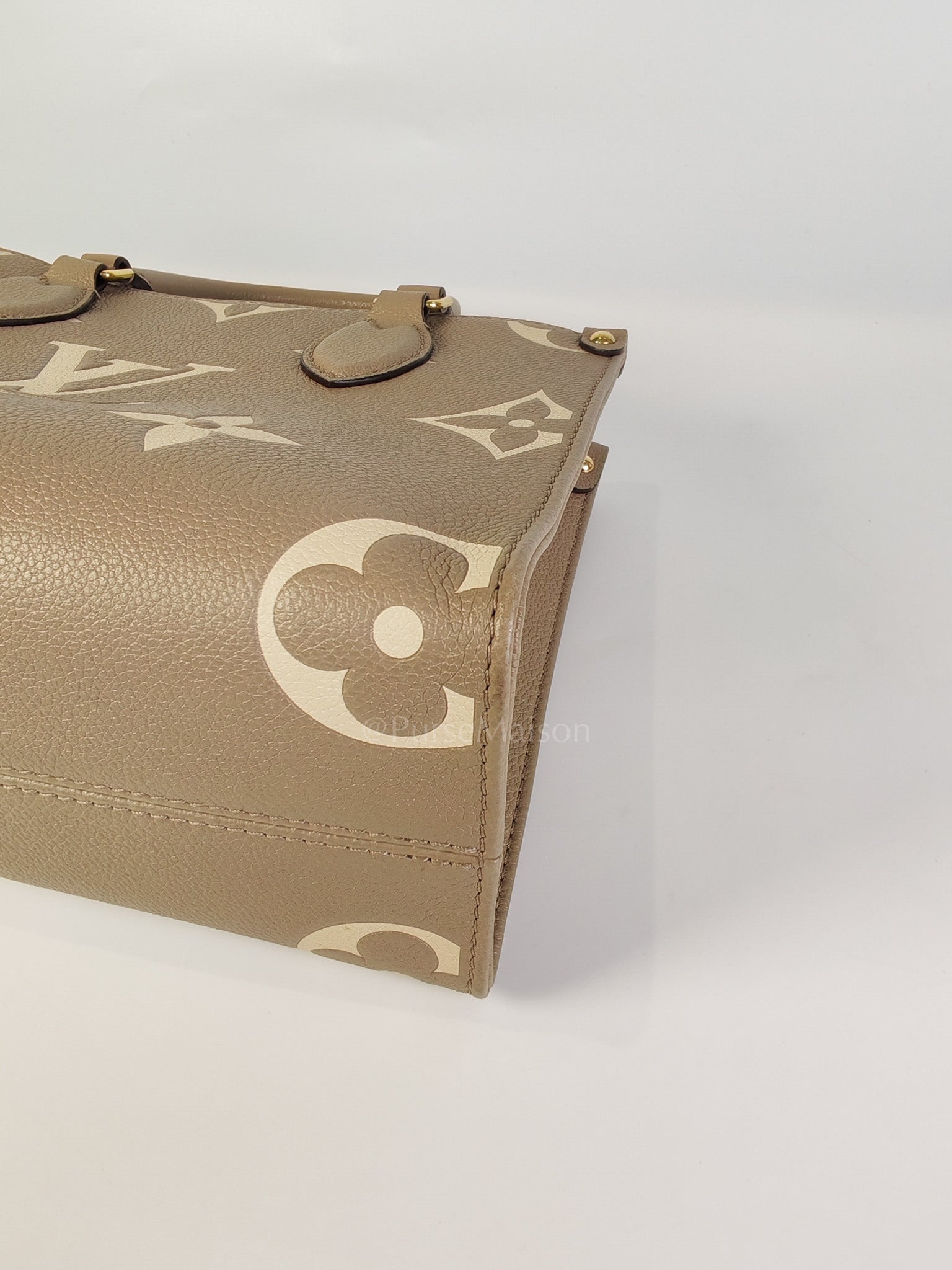 On The Go PM (OTG) in Tourterelle Creme in Monogram Empreinte Leather (Microchip) | Purse Maison Luxury Bags Shop