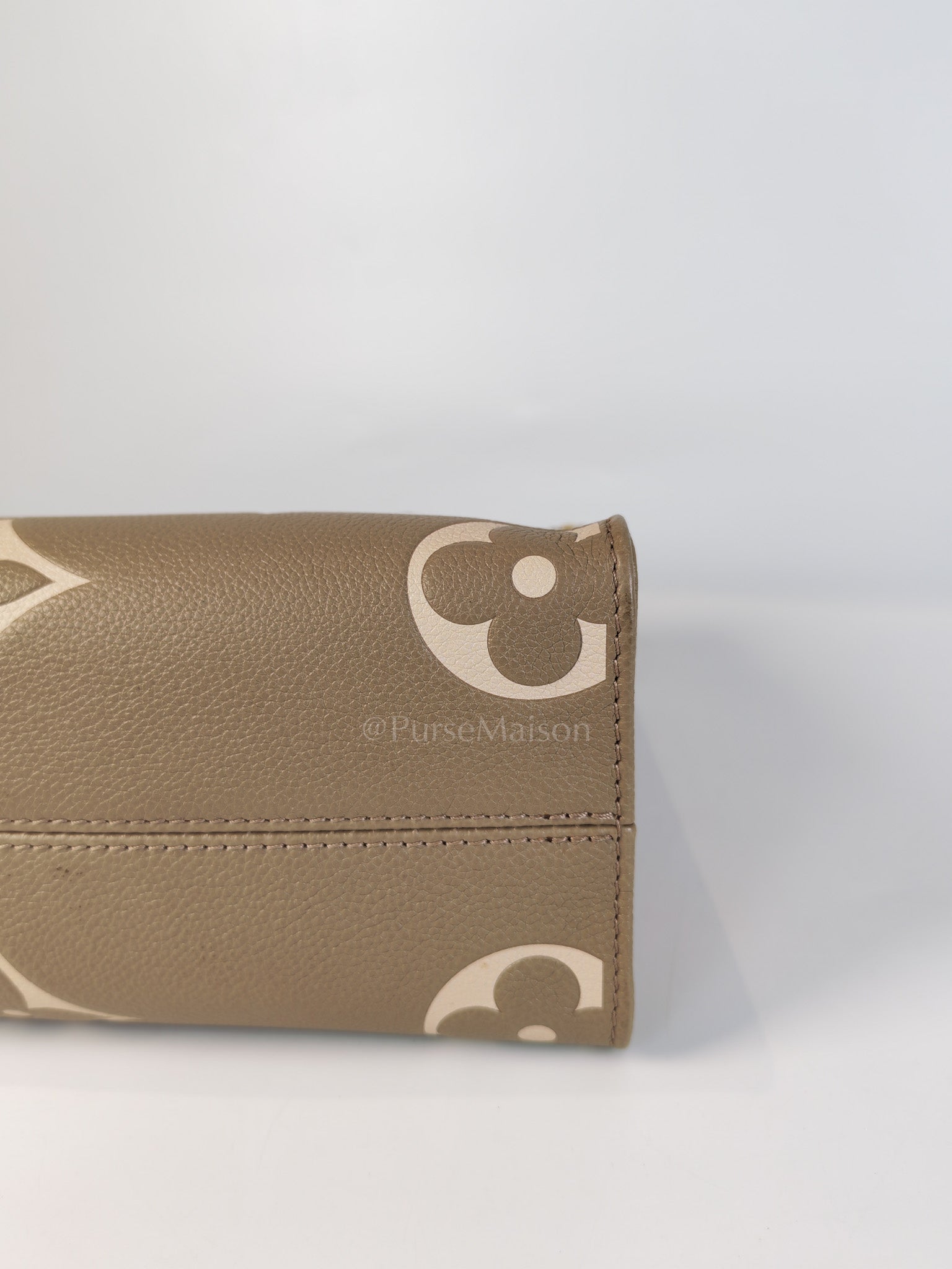 On The Go PM (OTG) in Tourterelle Creme in Monogram Empreinte Leather (Microchip) | Purse Maison Luxury Bags Shop