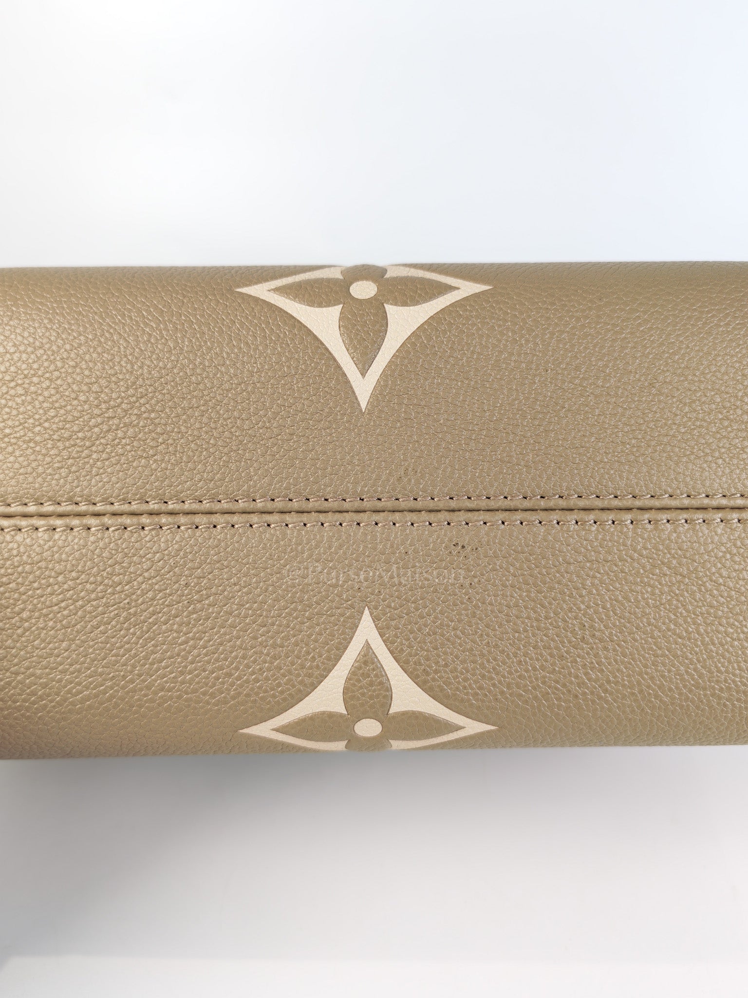 On The Go PM (OTG) in Tourterelle Creme in Monogram Empreinte Leather (Microchip) | Purse Maison Luxury Bags Shop