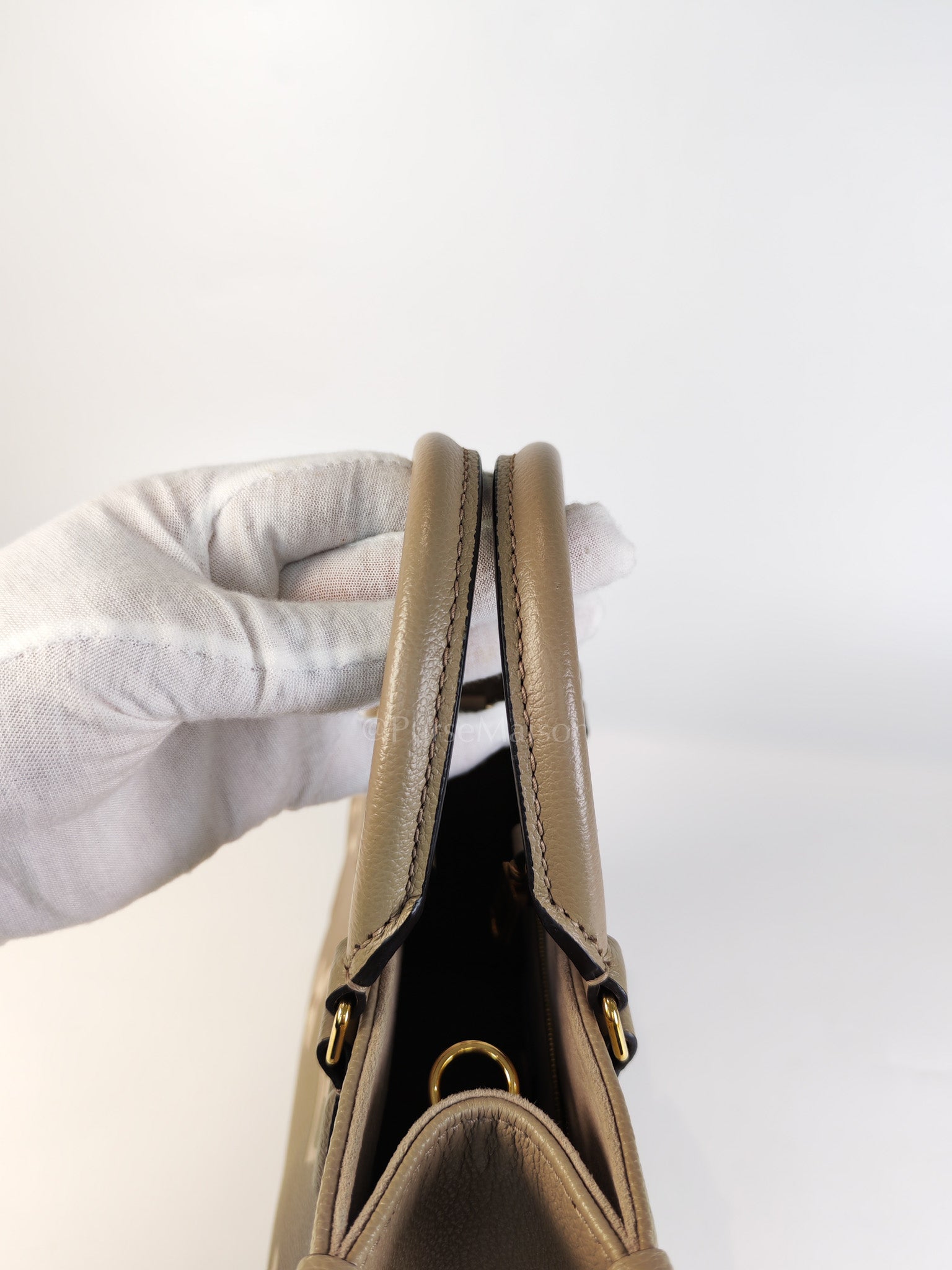 On The Go PM (OTG) in Tourterelle Creme in Monogram Empreinte Leather (Microchip) | Purse Maison Luxury Bags Shop