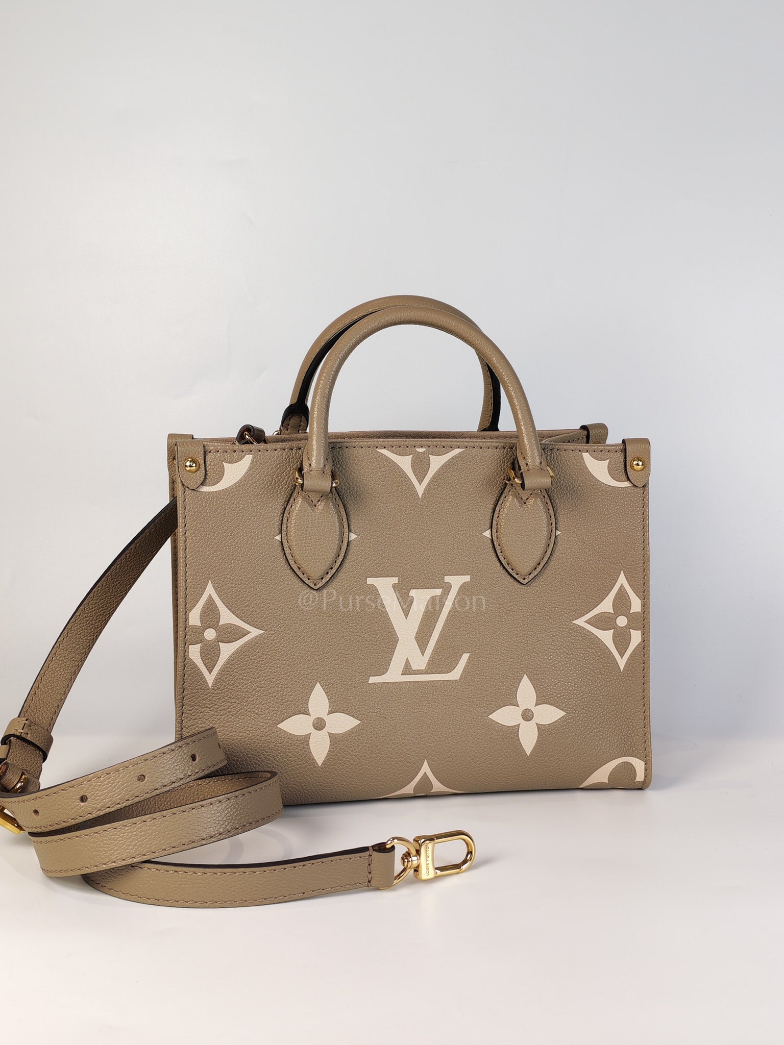 On The Go PM (OTG) in Tourterelle Creme in Monogram Empreinte Leather (Microchip) | Purse Maison Luxury Bags Shop