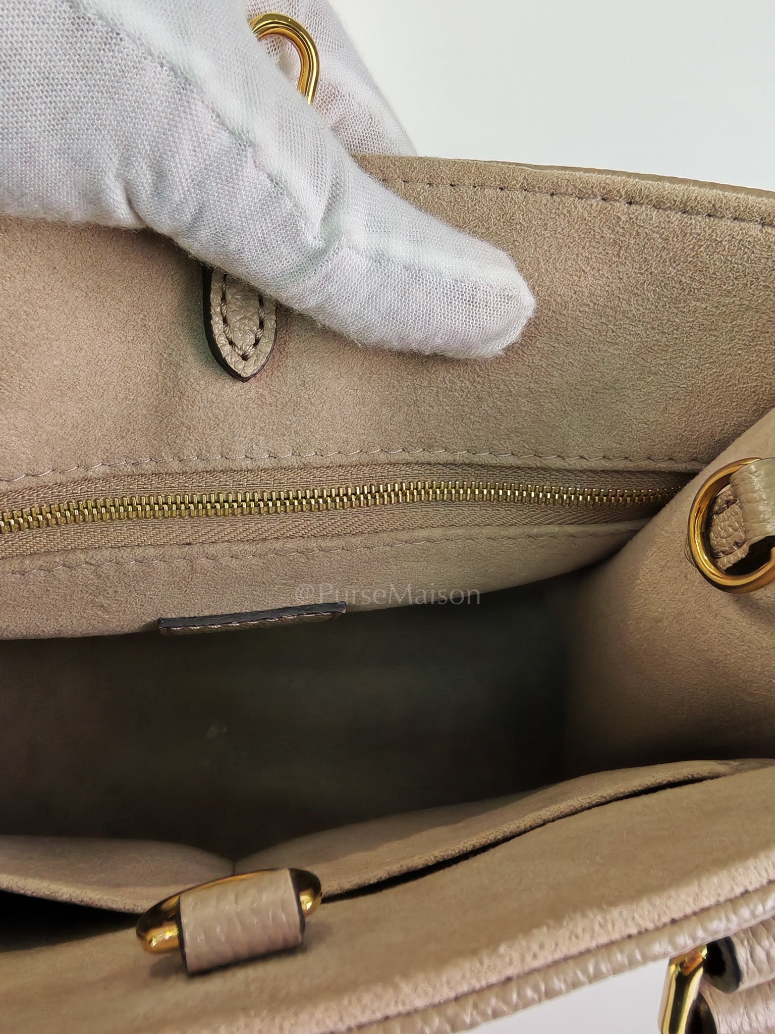 On The Go PM (OTG) in Tourterelle Creme in Monogram Empreinte Leather (Microchip) | Purse Maison Luxury Bags Shop