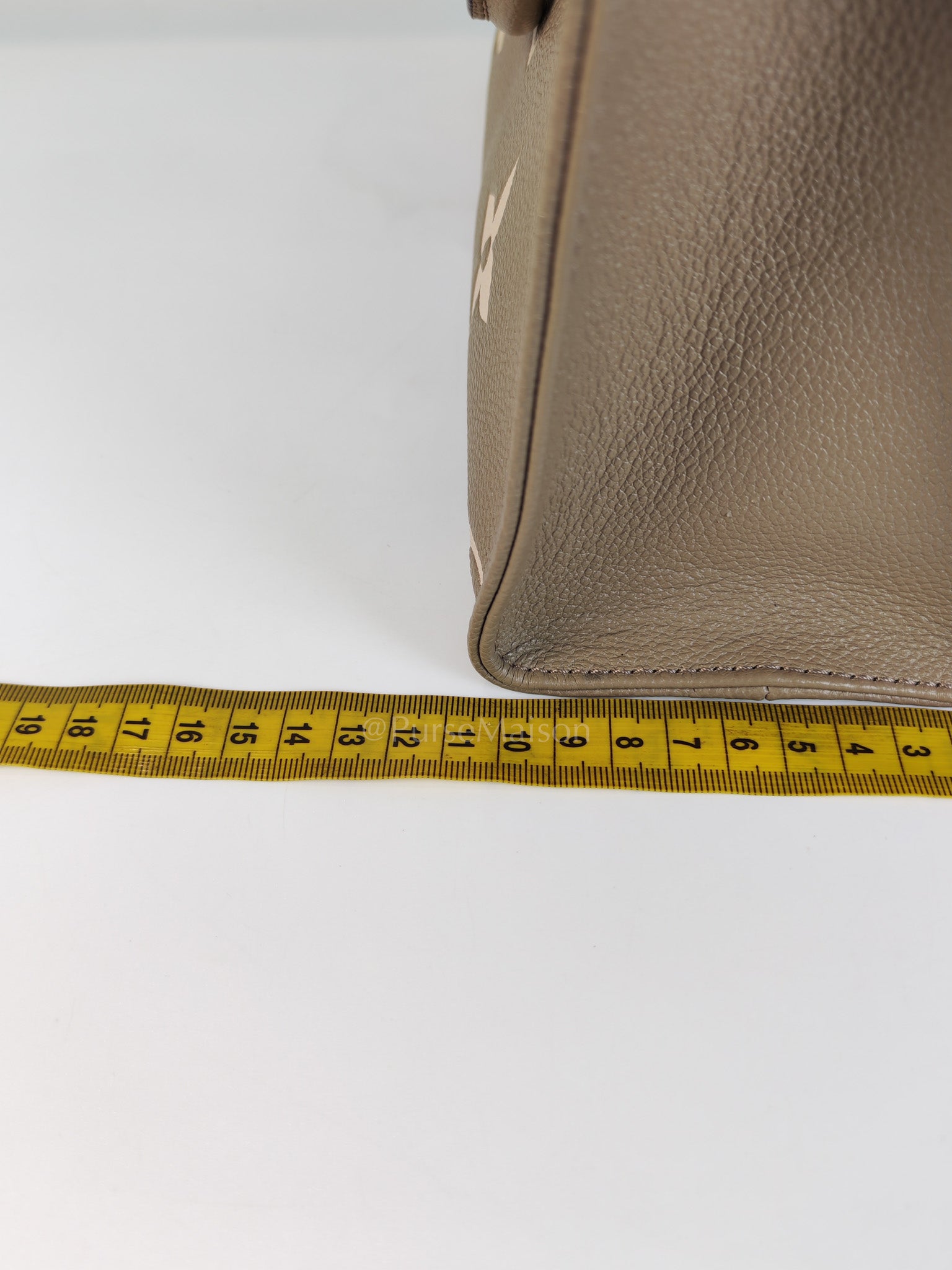 On The Go PM (OTG) in Tourterelle Creme in Monogram Empreinte Leather (Microchip) | Purse Maison Luxury Bags Shop