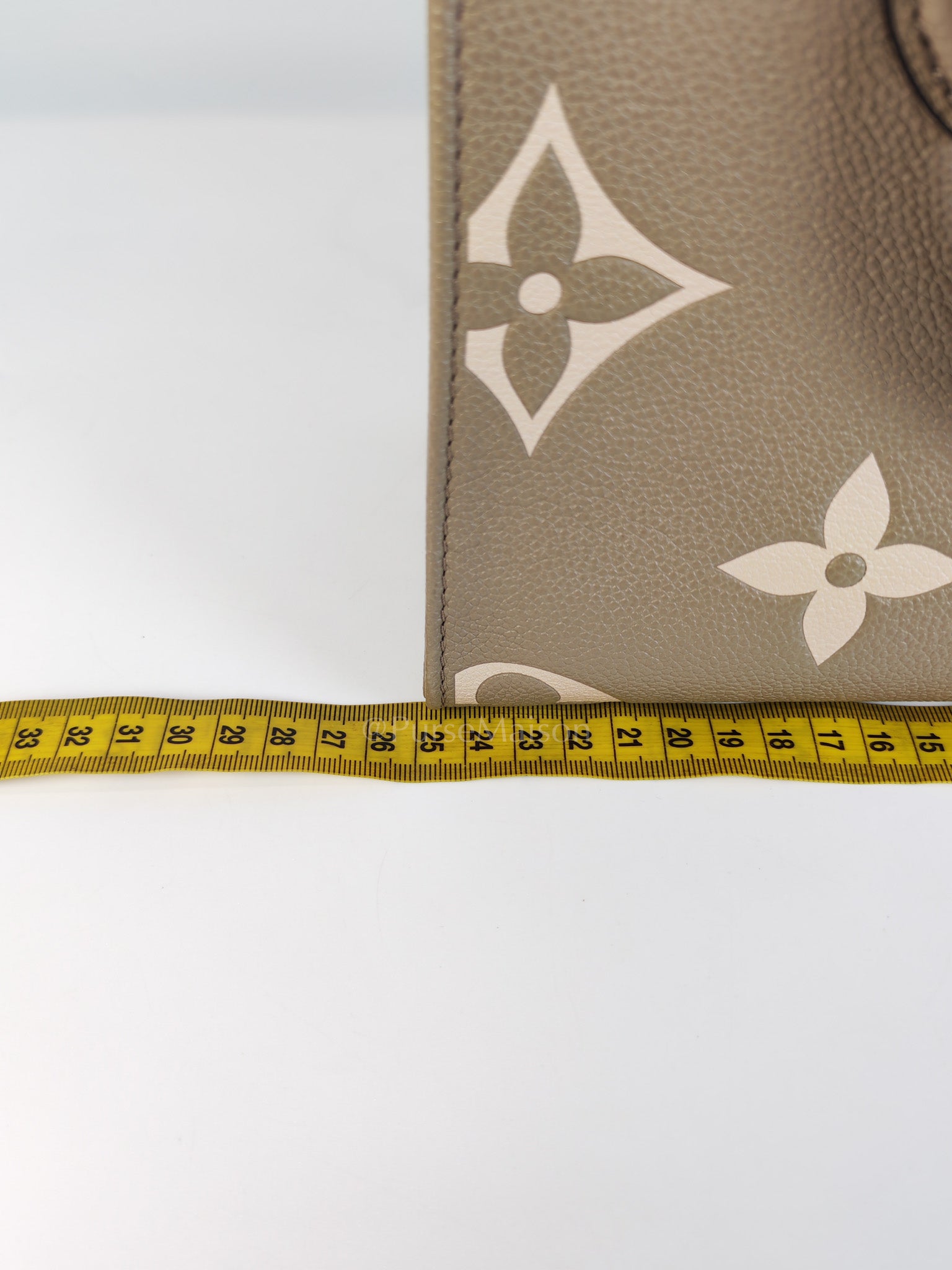 On The Go PM (OTG) in Tourterelle Creme in Monogram Empreinte Leather (Microchip) | Purse Maison Luxury Bags Shop